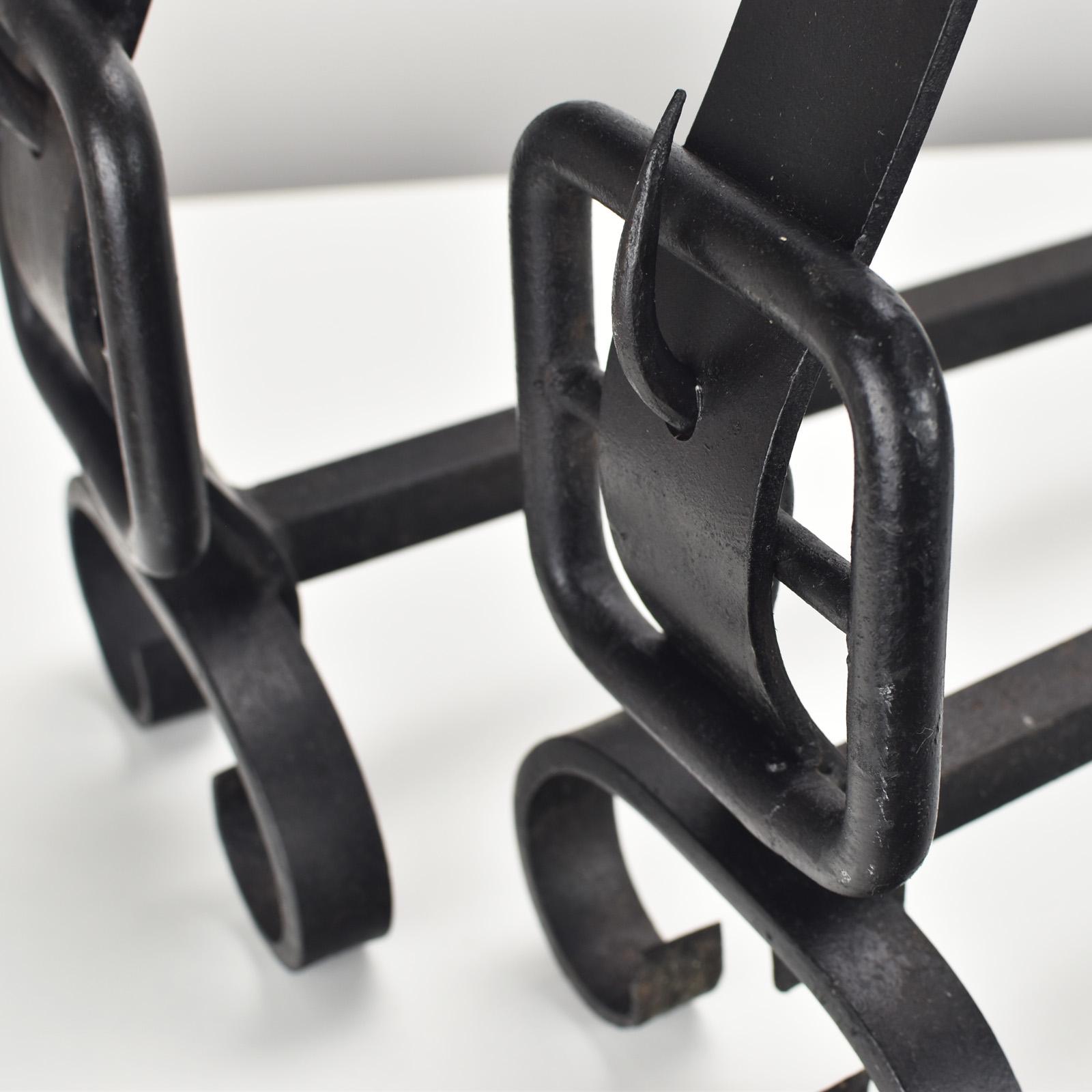 French Pair of Wrought Iron Andirons Firedogs France ca. 1950s Jacques Adnet Style For Sale
