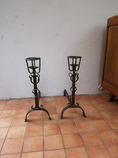 pair of wrought iron andirons
