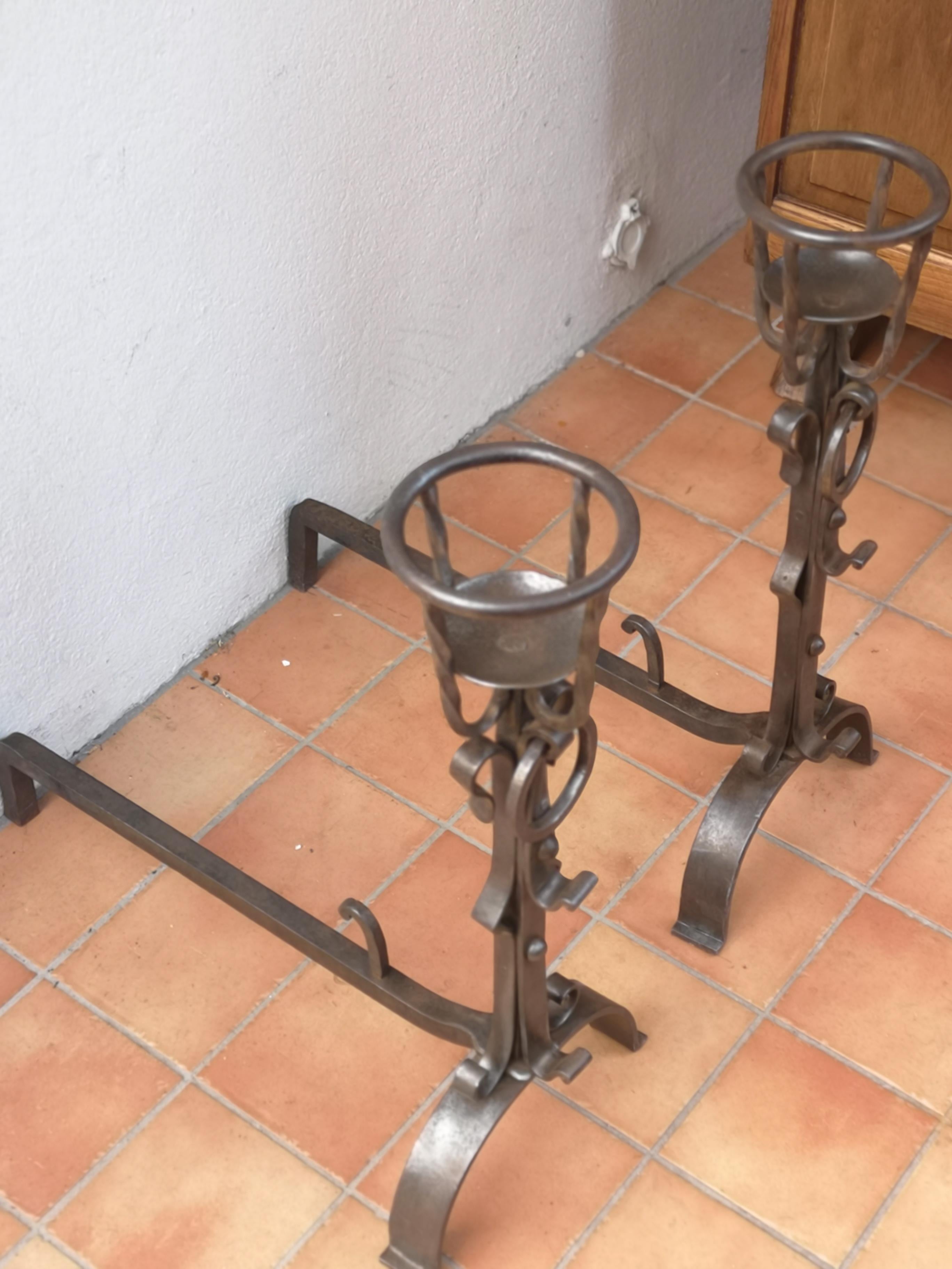 20th Century pair of wrought iron andirons For Sale