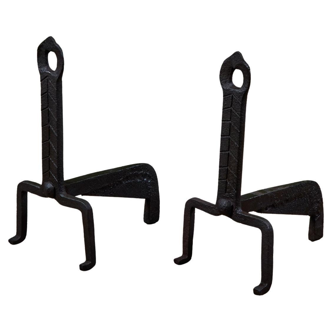 Paire de chenets en fer forgé
