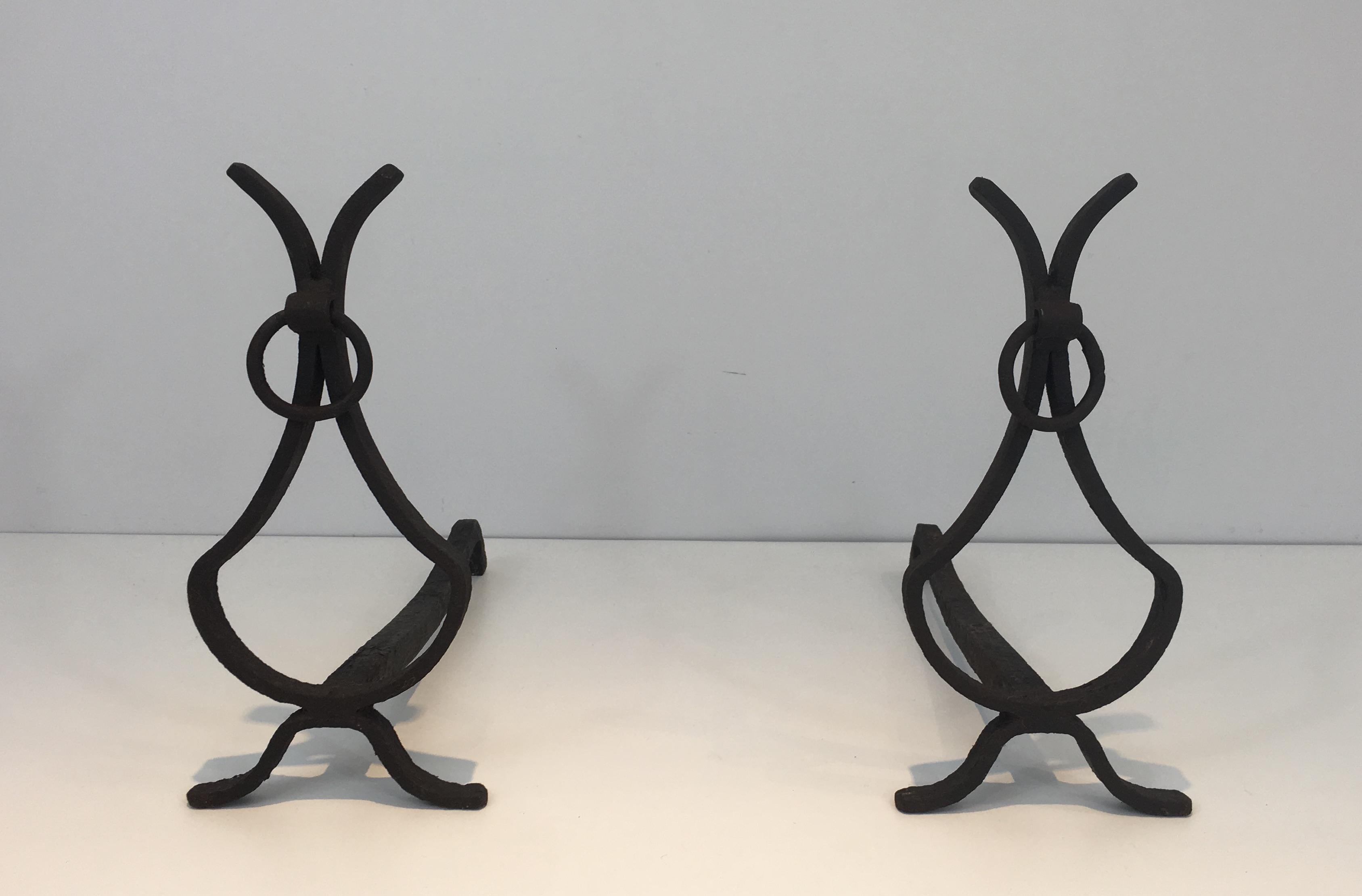 Pair of wrought iron andirons, French, circa 1940.