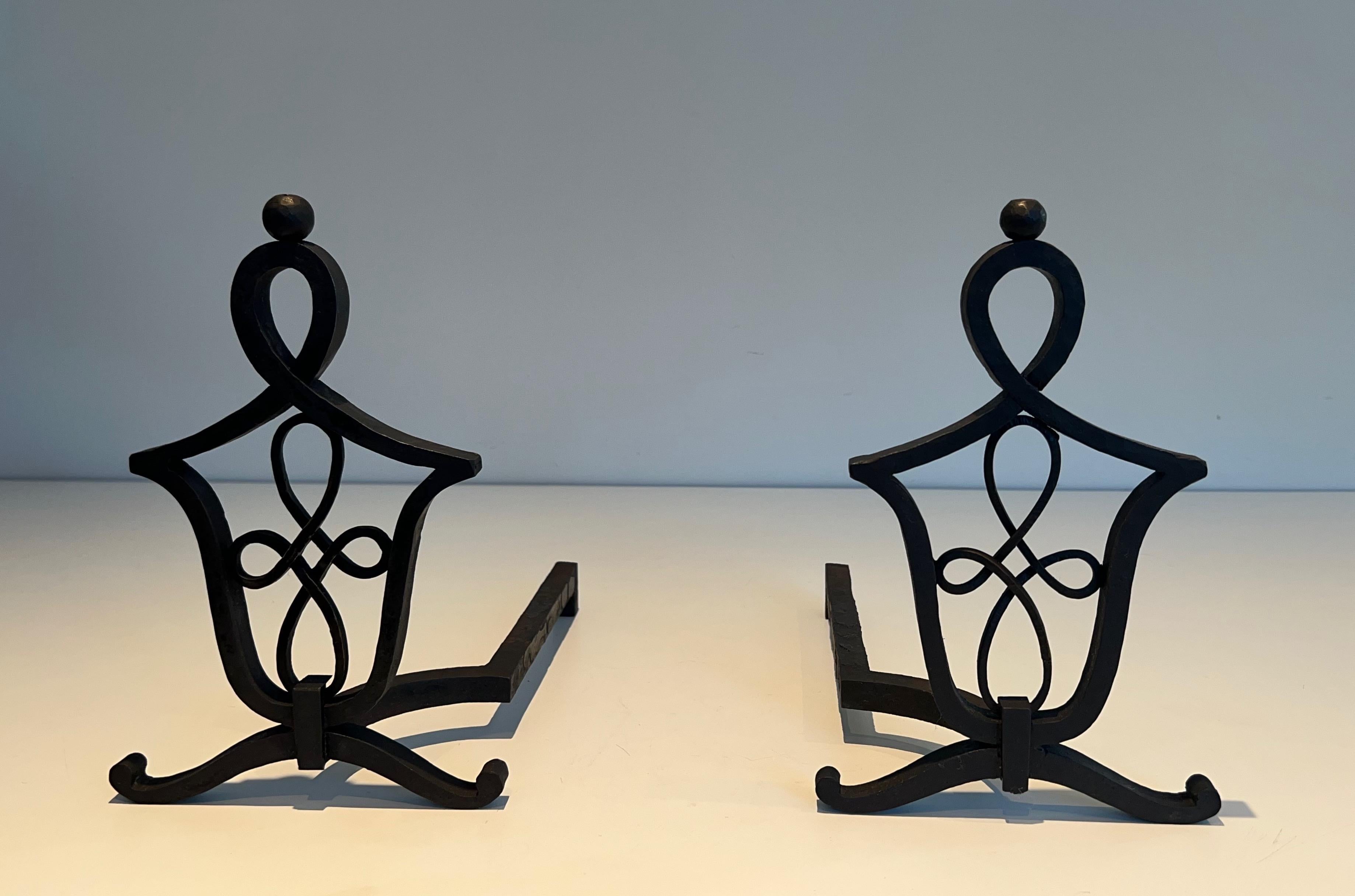 Art Deco Pair of Wrought Iron Andirons in the Style of Raymond Subes For Sale