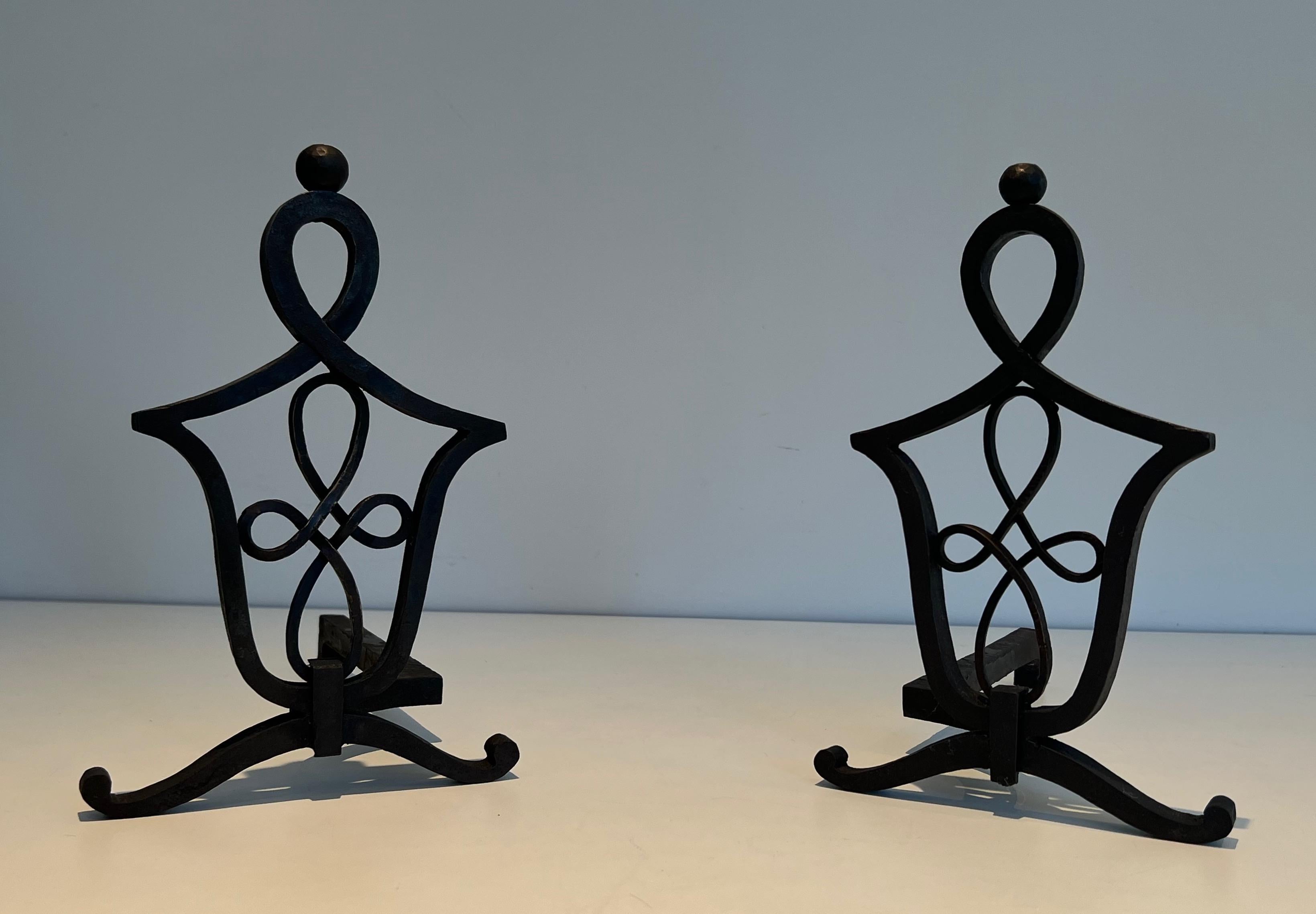French Pair of Wrought Iron Andirons in the Style of Raymond Subes For Sale