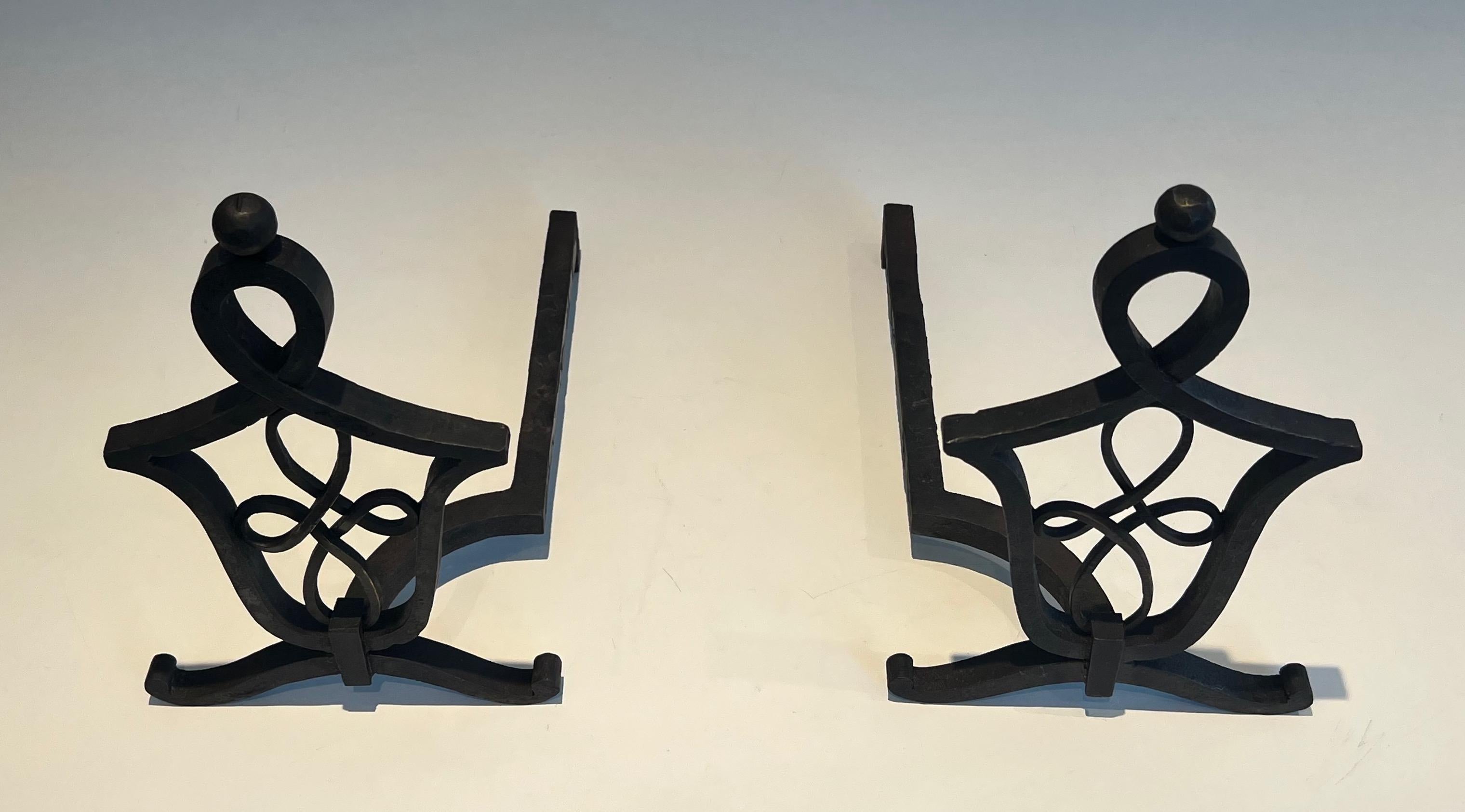 Pair of Wrought Iron Andirons in the Style of Raymond Subes In Good Condition For Sale In Marcq-en-Barœul, Hauts-de-France