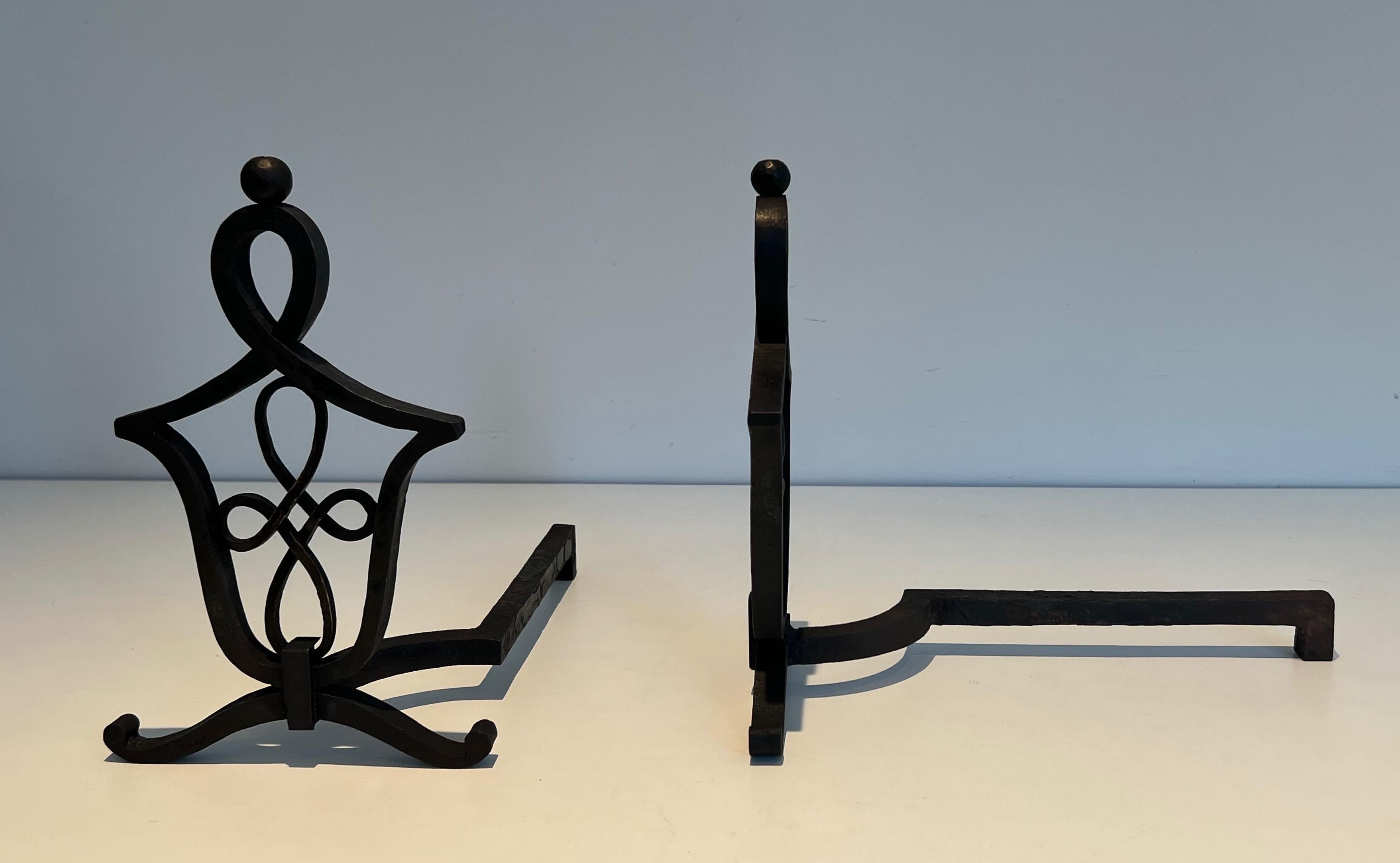 Mid-20th Century Pair of Wrought Iron Andirons in the Style of Raymond Subes For Sale