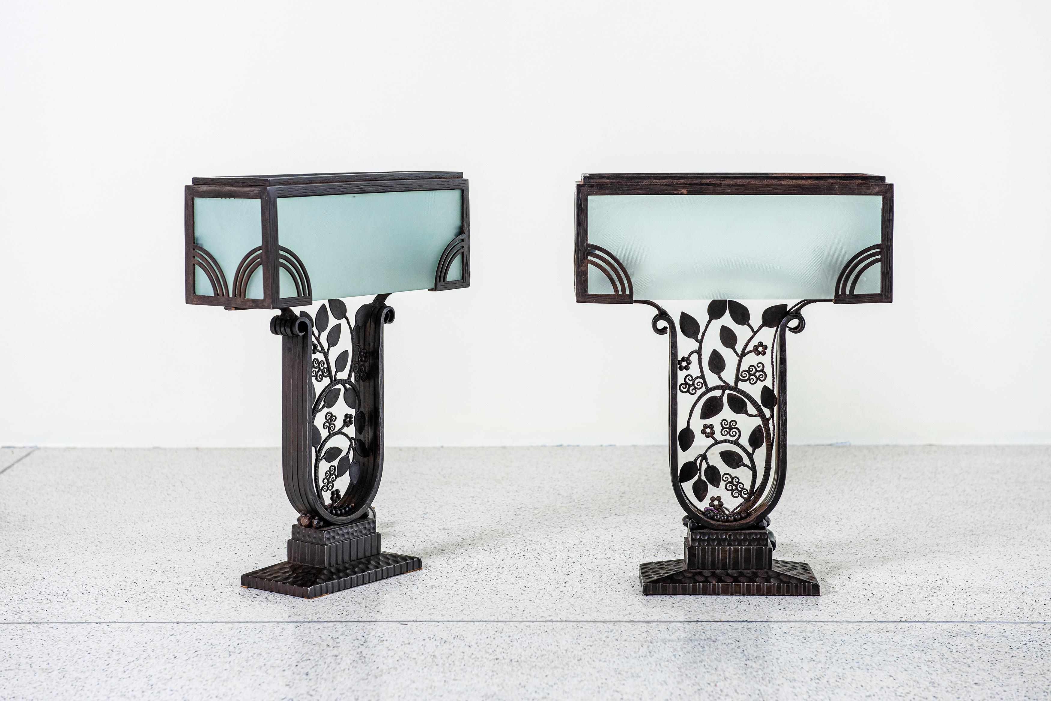 Pair of wrought-iron Art Deco table lamps, signed Edgar Brandt, circa 1925, France.
 