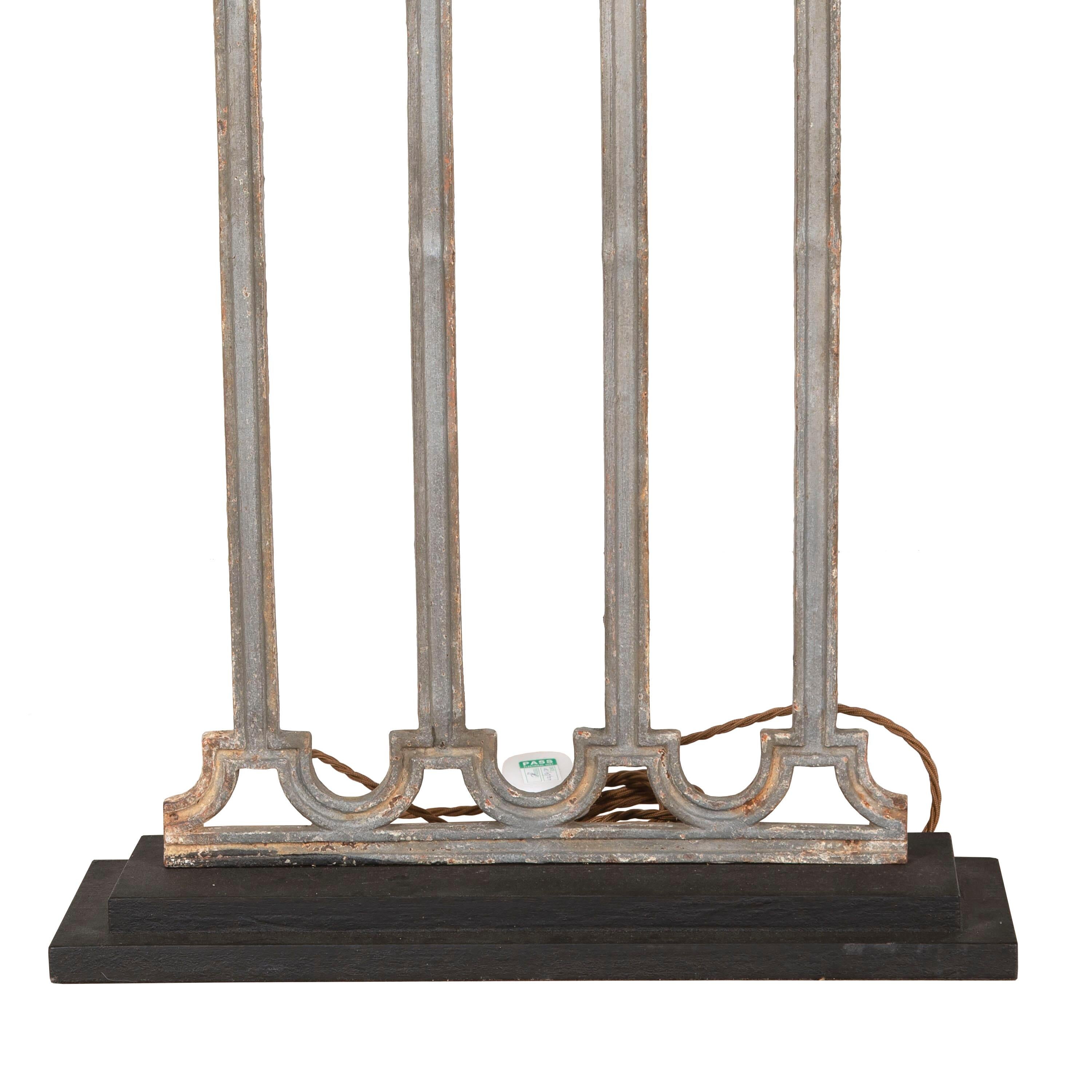 Pair of lamps made from wrought iron fragments that we have had converted in our artisan workshop.
With original patina, these lamps have been rewired and PAT tested to UK standards.
Height is to the bulb fitting, width and depth is of the