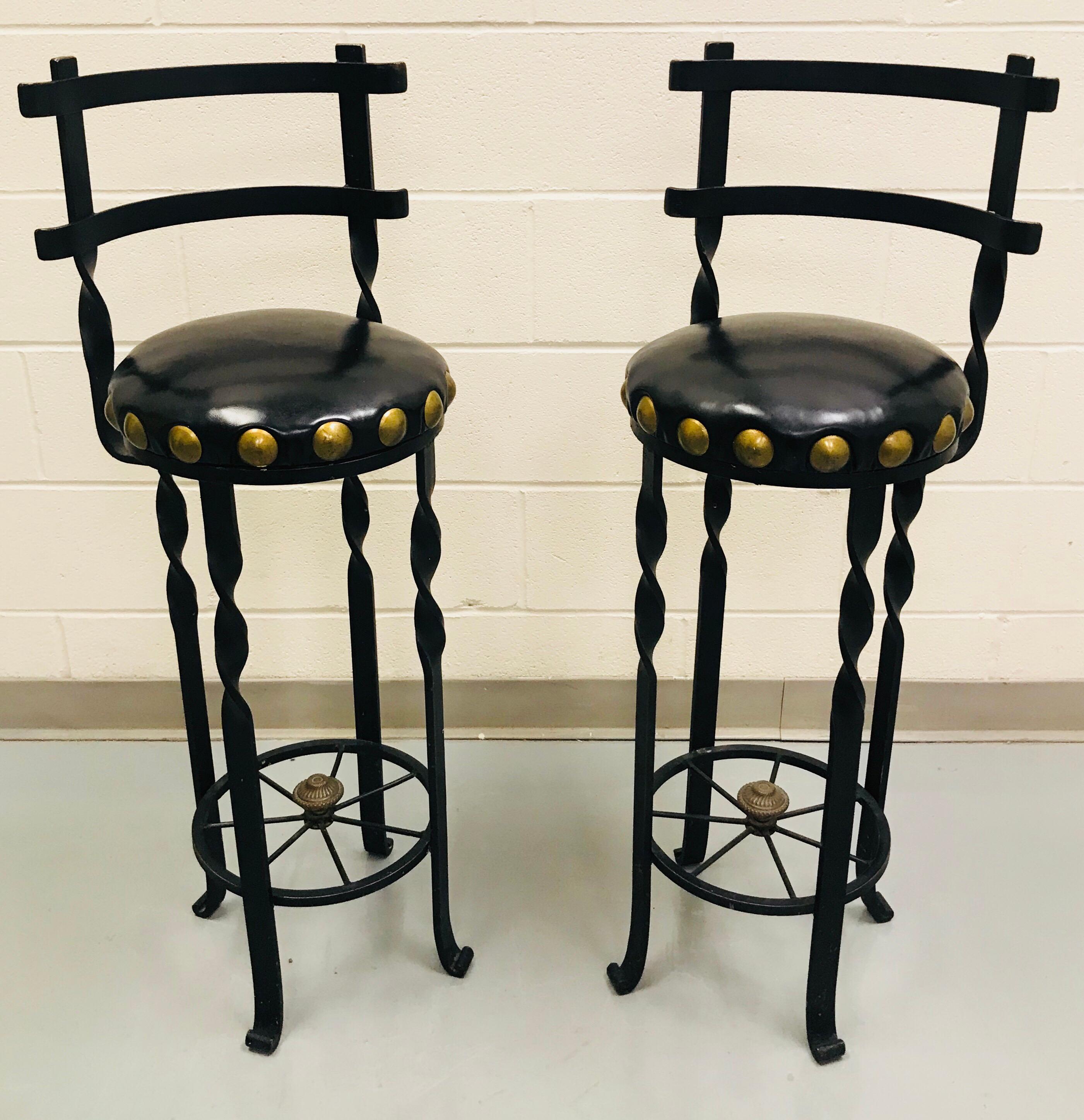 Pair of wrought iron bar or counter stools.