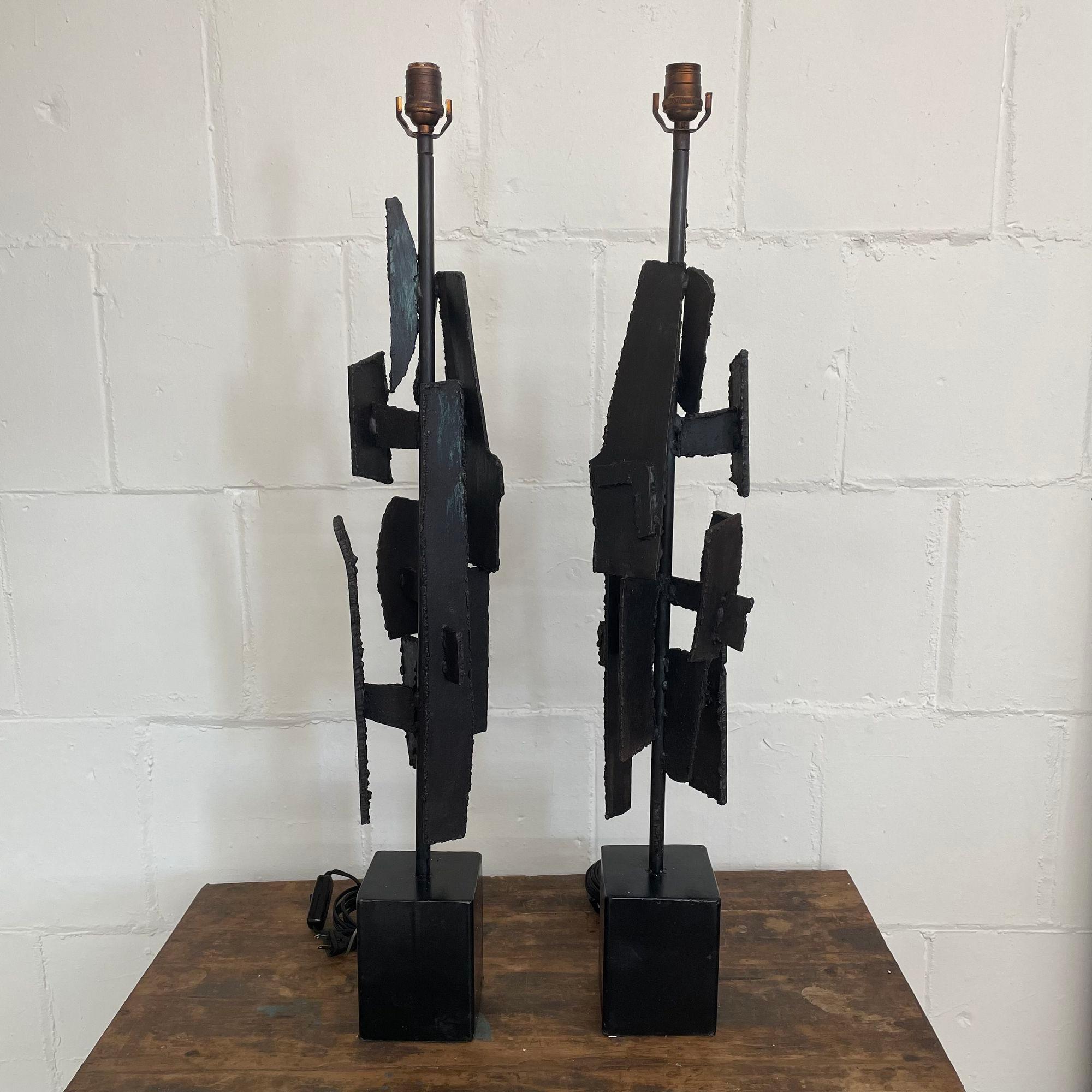 Pair of Hand Welded Wrought Iron Brutalist Style Mid-Century Modern Table Lamps

About Pair of Laurel modernist brutalist blackened steel lamps. In the manner of Paul Evans or Adrian Pearsall. Each lamp takes one light bulb.

Steel, Wrought
