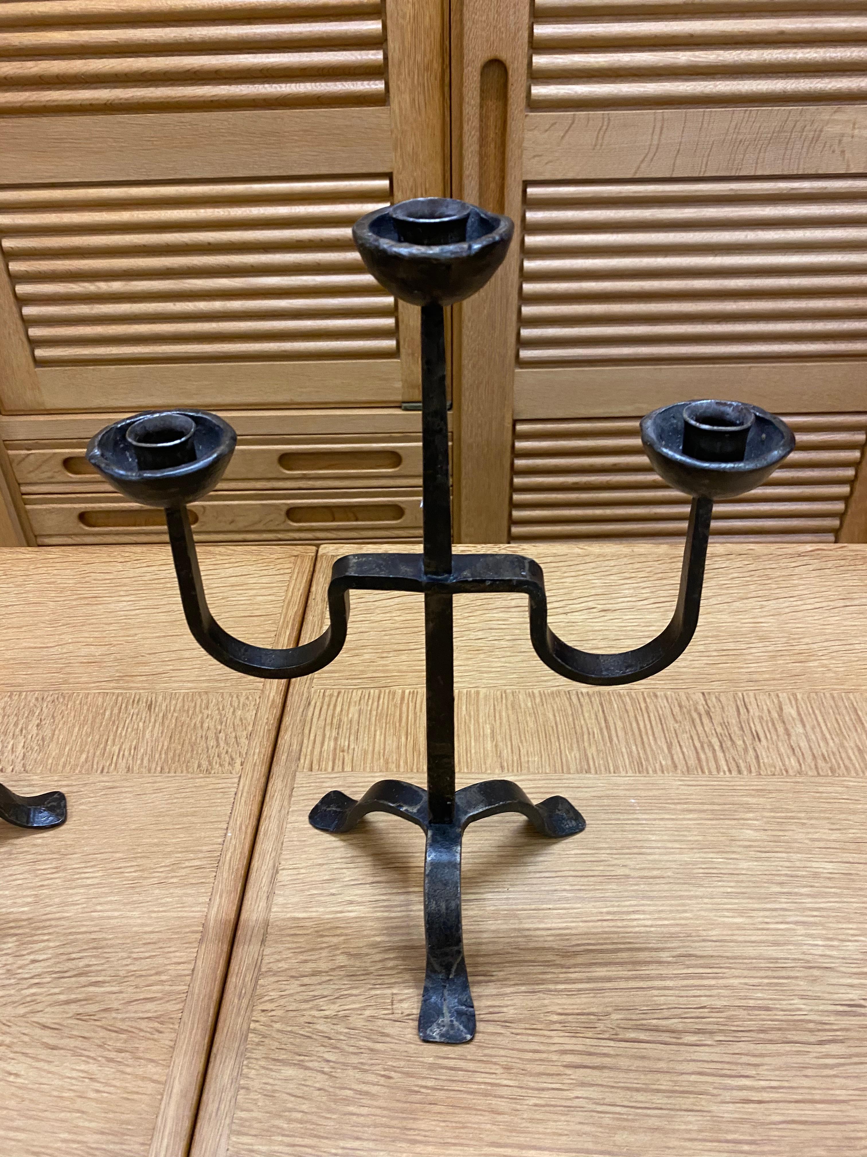 Pair of wrought iron candelabra, in the style of the Artisans of Marolles, circa 1950-1960
Designed for candles
Same model but 1 is 39 cm high and the other 40 cm.