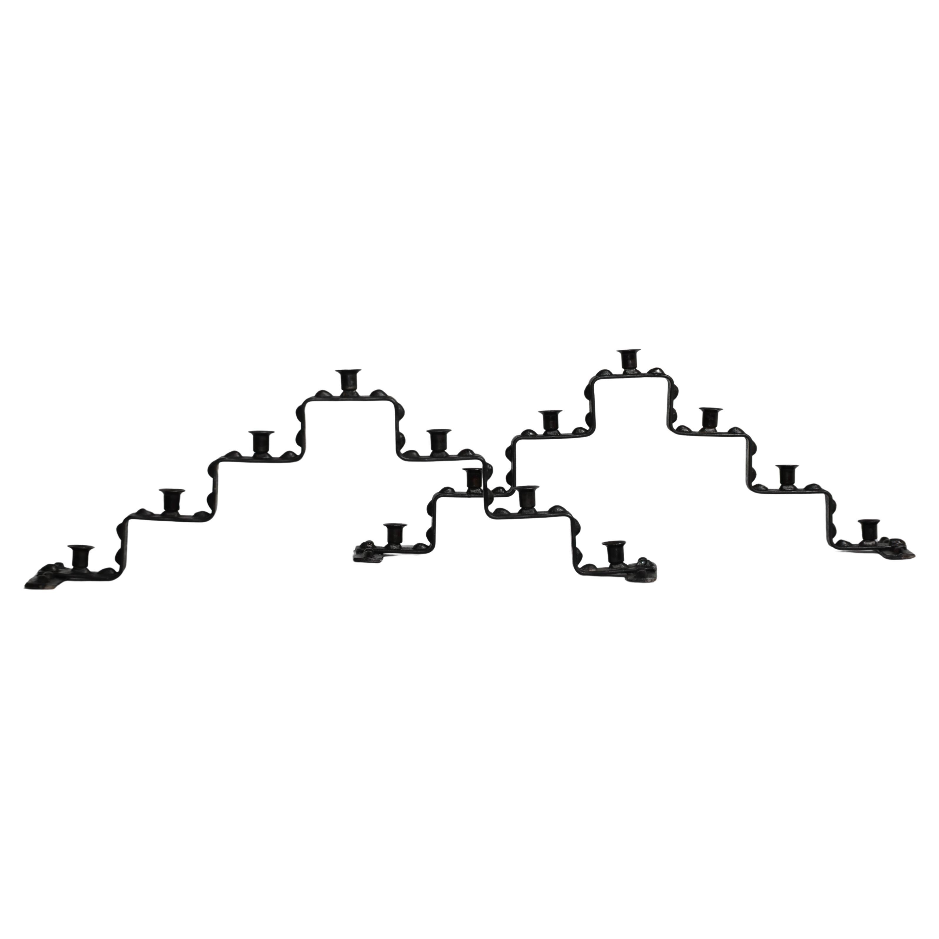 Coppia di portacandele in ferro battuto, inizio XX secolo