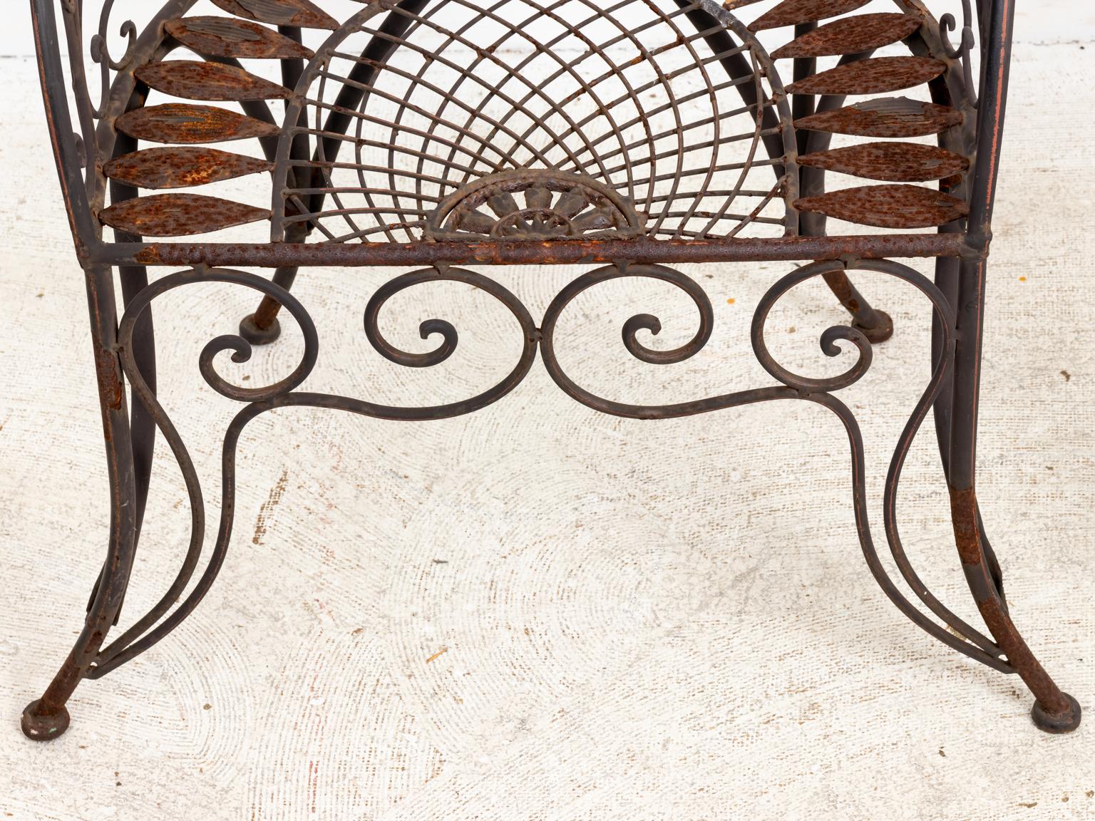Pair of Wrought Iron Curved Back Garden Chairs with Scrollwork In Good Condition In Stamford, CT