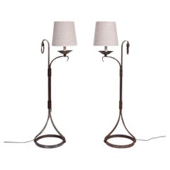 Pair of wrought iron floor lamps, 1960s.