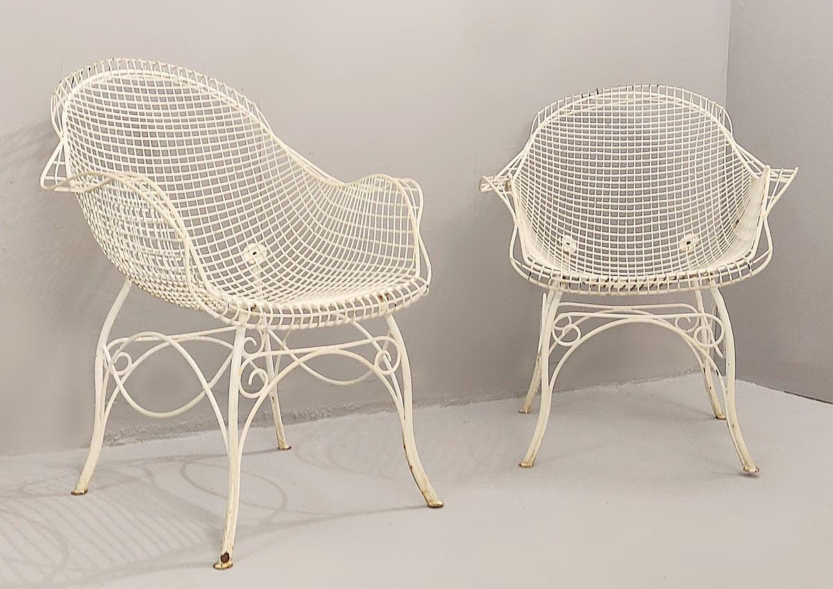 Pair of wrought iron garden armchairs painted, 1950.