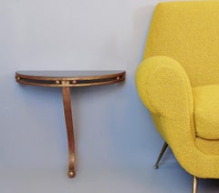 Pair of Wrought Iron Gold and Black Glass Top Half Moon Wall Consoles