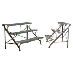 Pair of Wrought Iron Green Painted "Arras" Folding Plant Stands, circa 1900