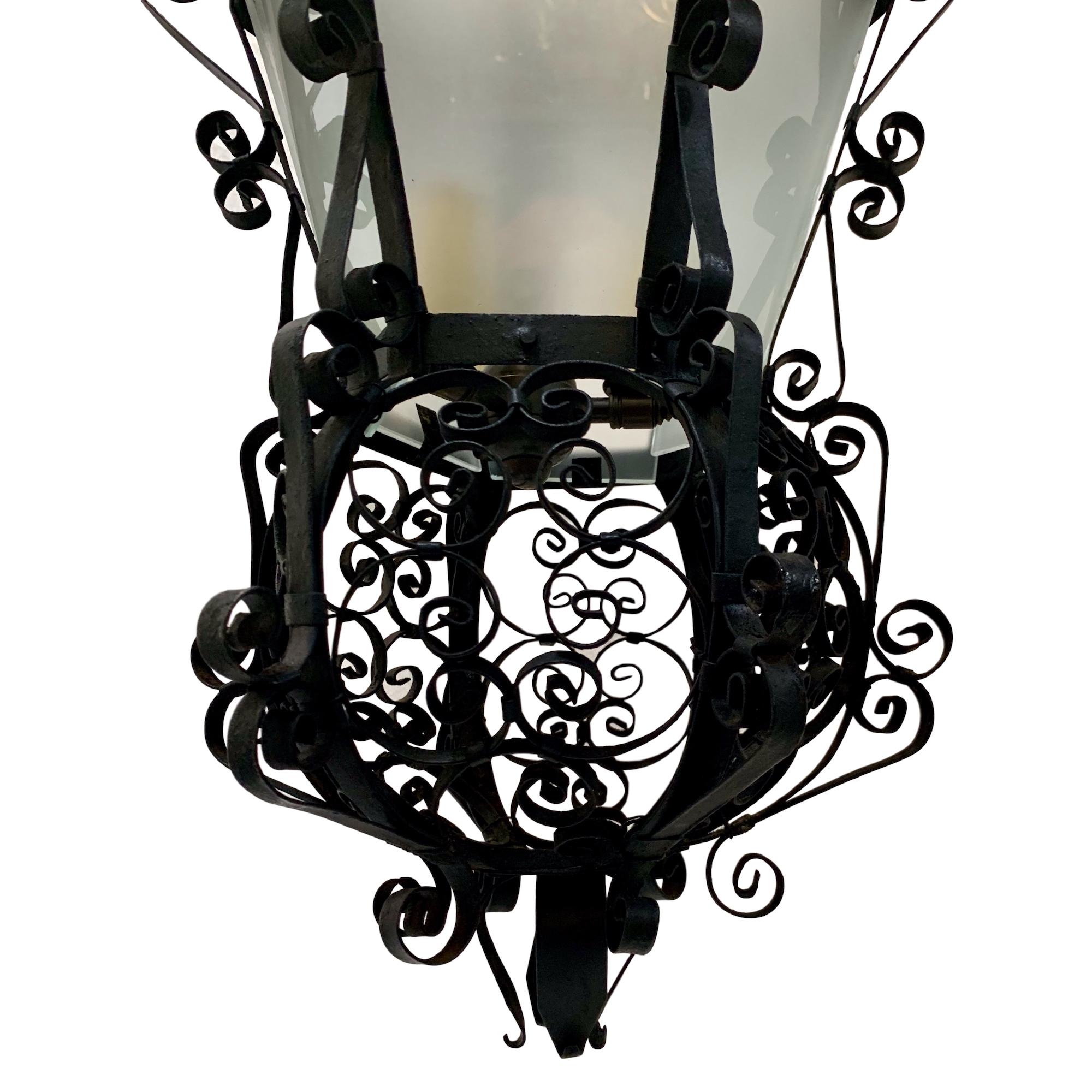 Pair of Wrought Iron Lanterns, Sold Individually In Good Condition For Sale In New York, NY