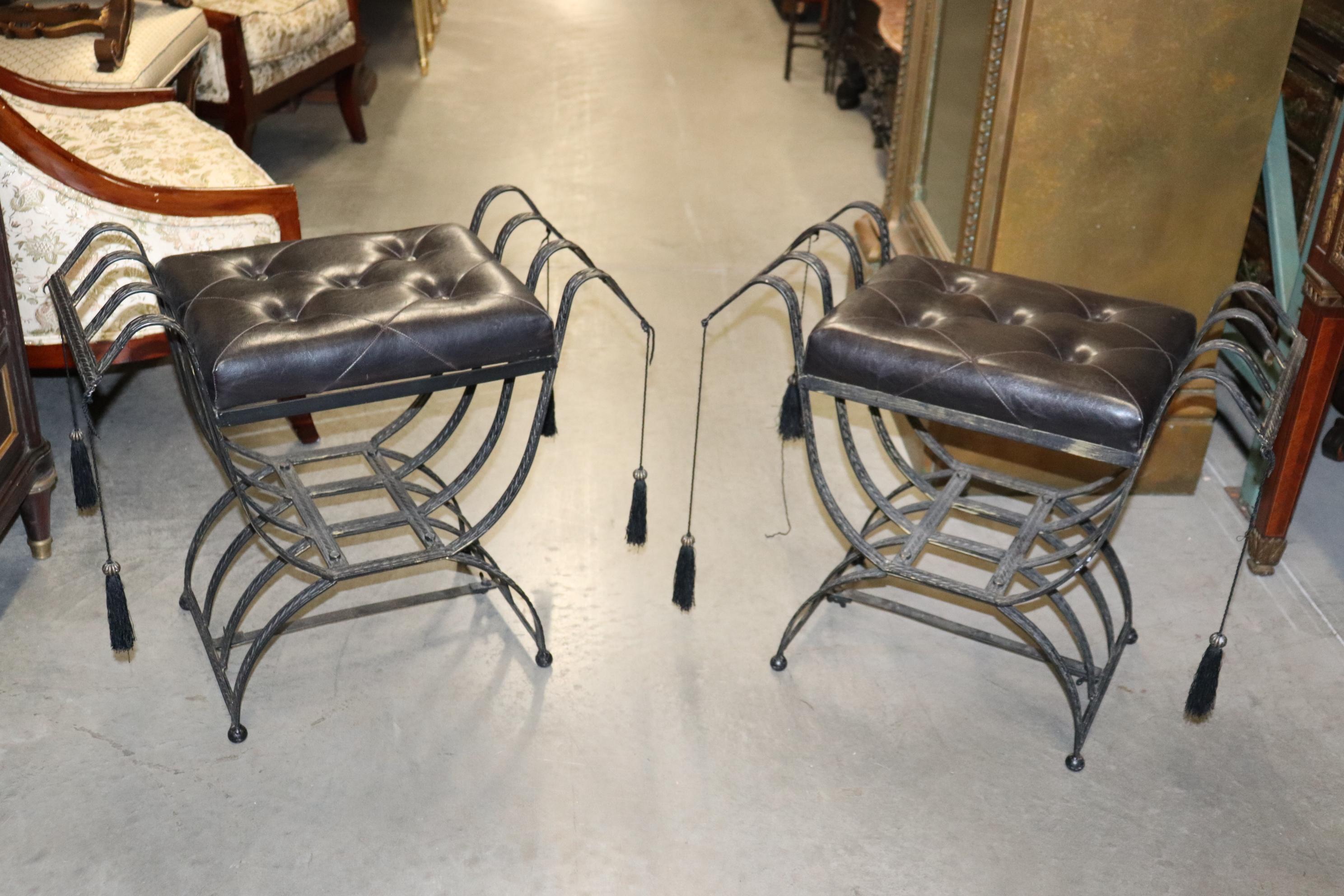 This is a beautiful pair of benches done in the Italian neoclassical style and in good condition. The benches have tassles and are very simple and decorative. They each measure 22 wide x 13.5 deep x 22 inches tall and the seat height is 20 inches