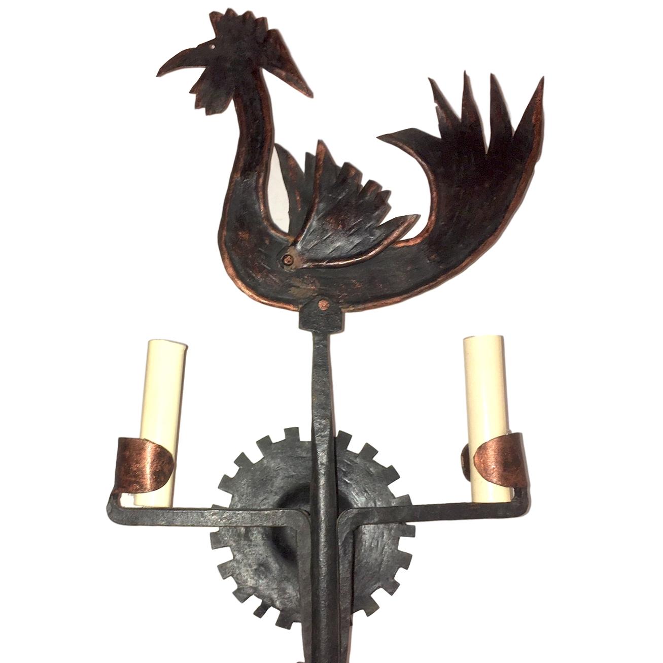 A pair of large circa 1930's Italian two-arm wrought iron rooster sconces.

Measurements:
Height: 23