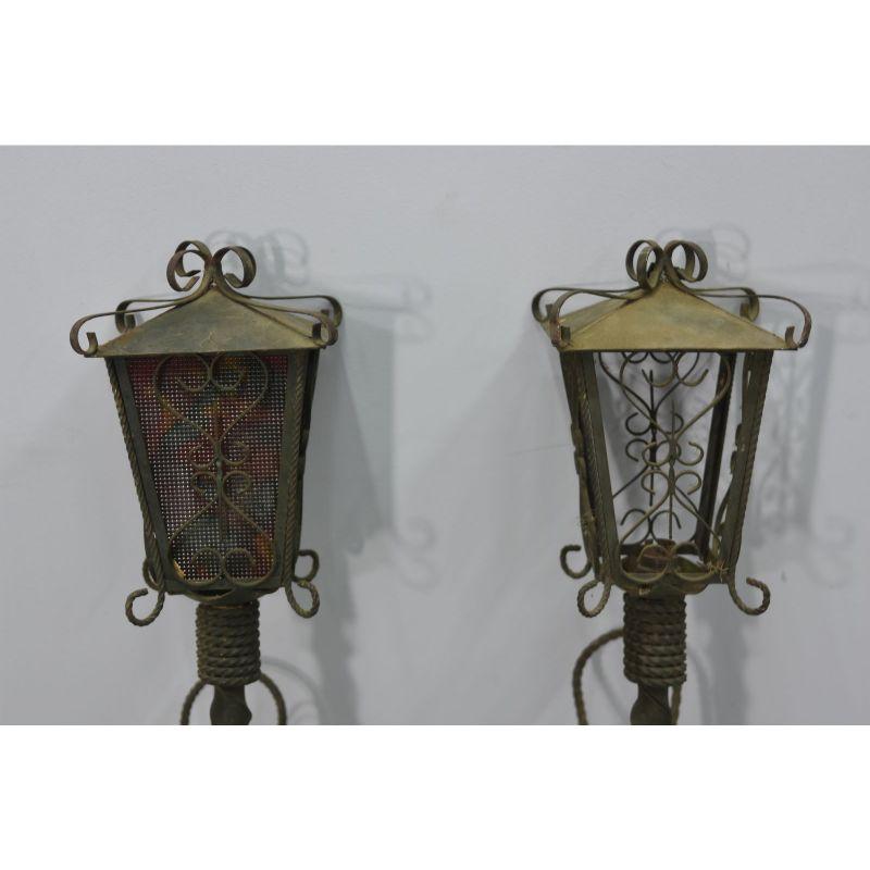 Pair of torch lanterns in wrought iron and wood from the early 20th century electrified for outdoor use, height 83 cm for a lampion size of 18 cm by 18 cm.