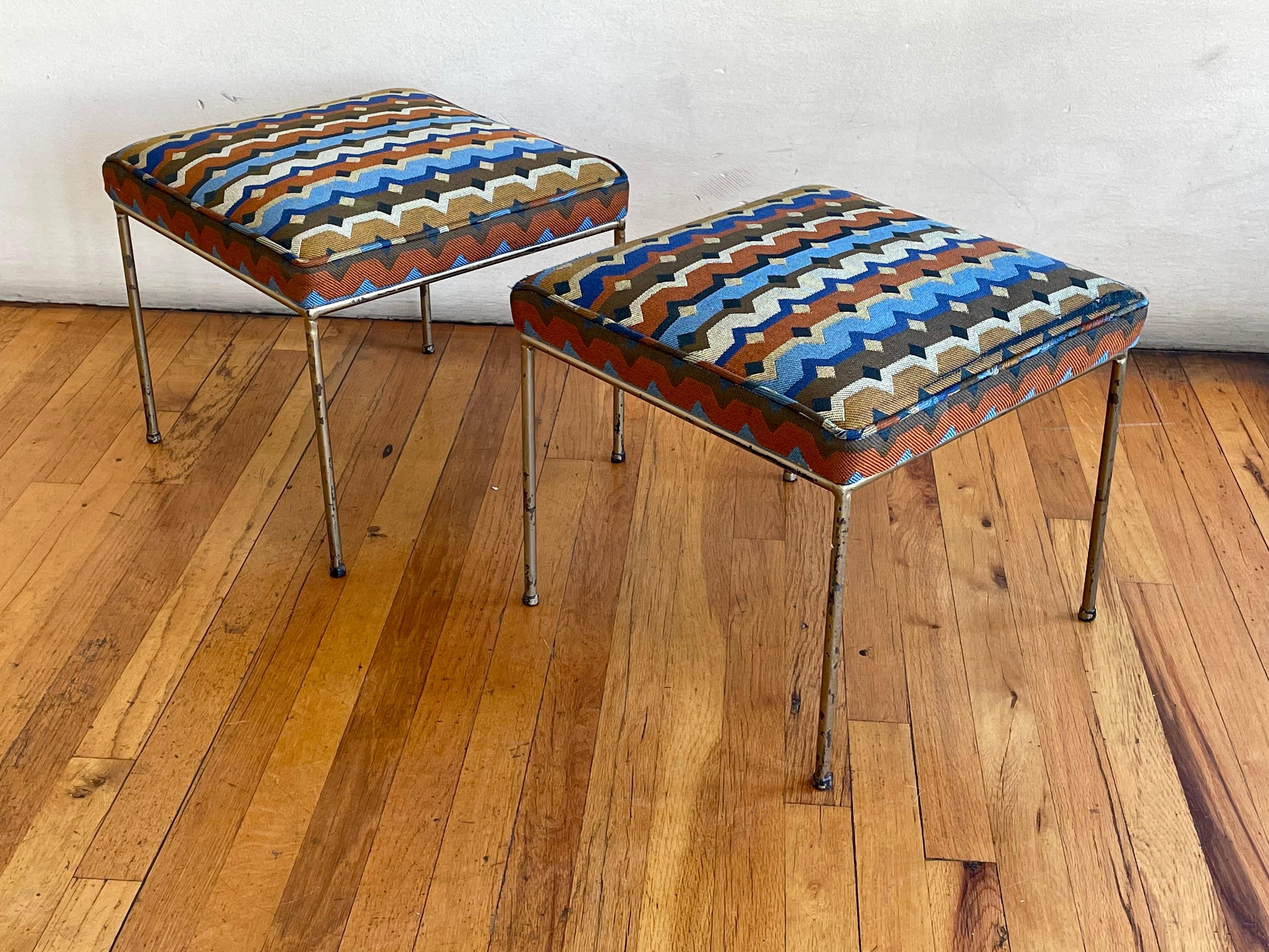Pair of wrought iron stools, designed in the 1950s by Paul McCobb and manufactured by Winchendon Furniture (Planner Group), great fabric Missioni style the bases have been repainted in gold some chips to the paint and small tear on the pipping of