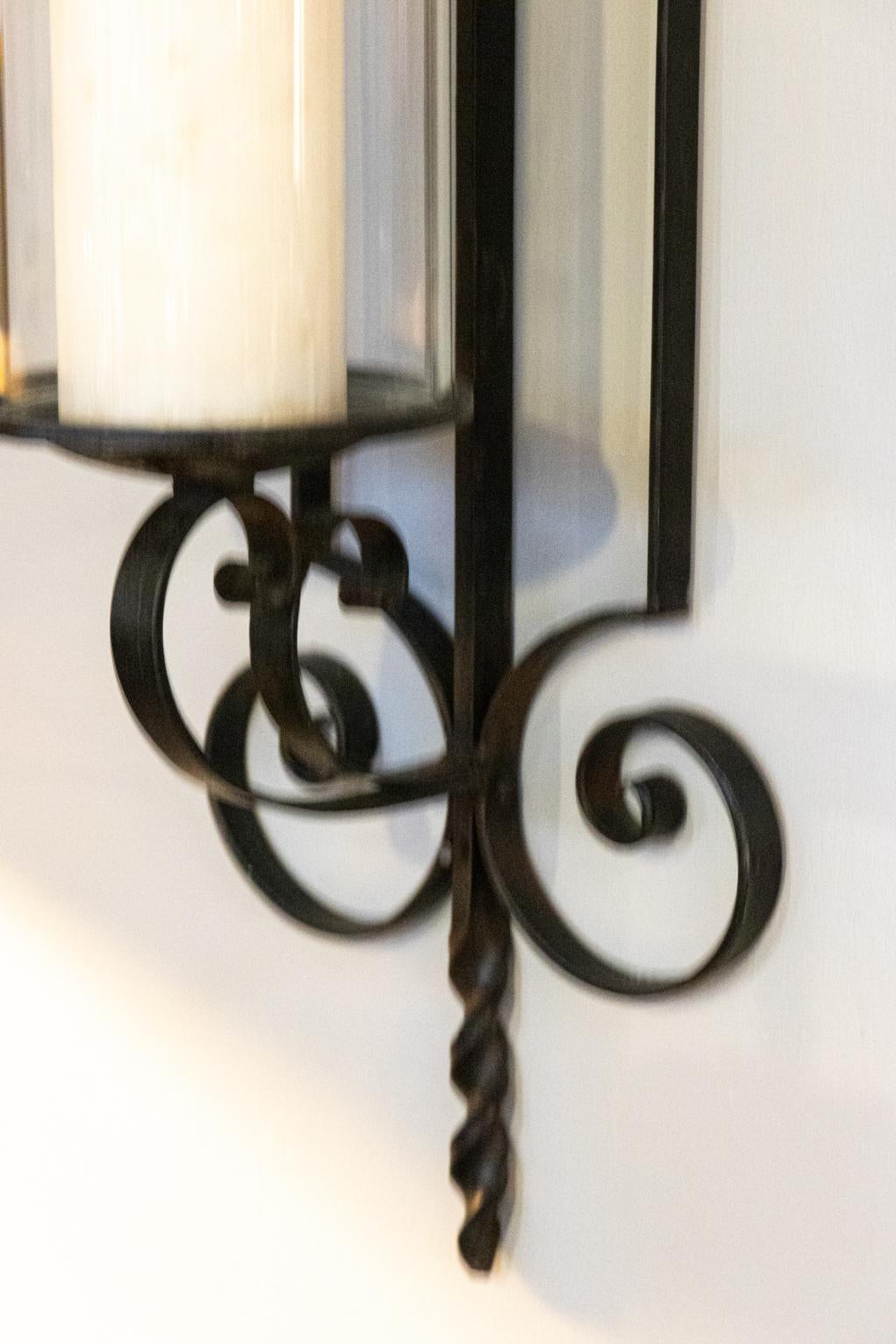 Glass Pair of Wrought Iron Wall Sconces