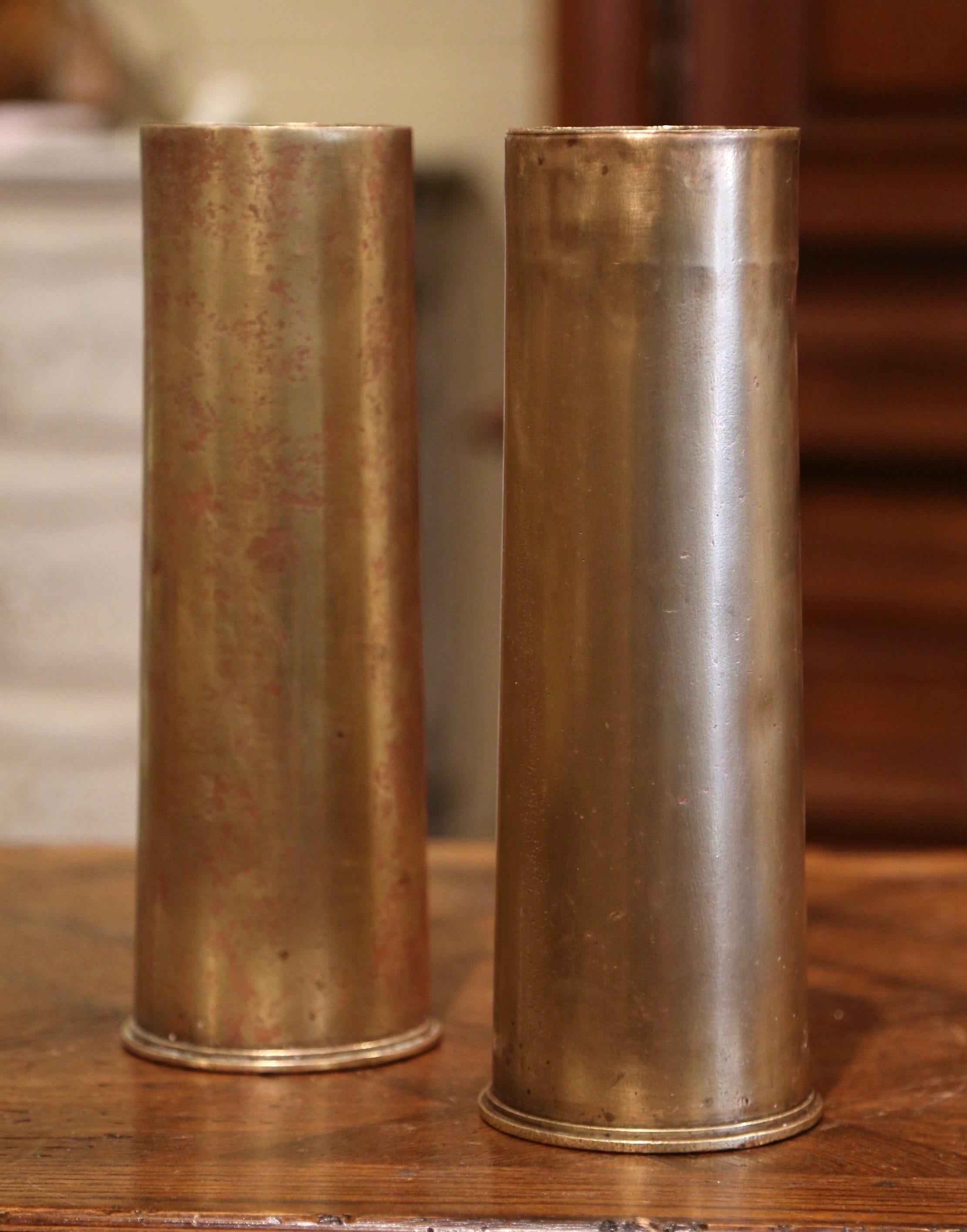 Take a piece of history into your home with these authentic English bombshells from the First World War (WWI 1914-1918). Made of brass, the impressive pieces of artillery are round in shape and dated on the bottom 1915. These one of a kind
