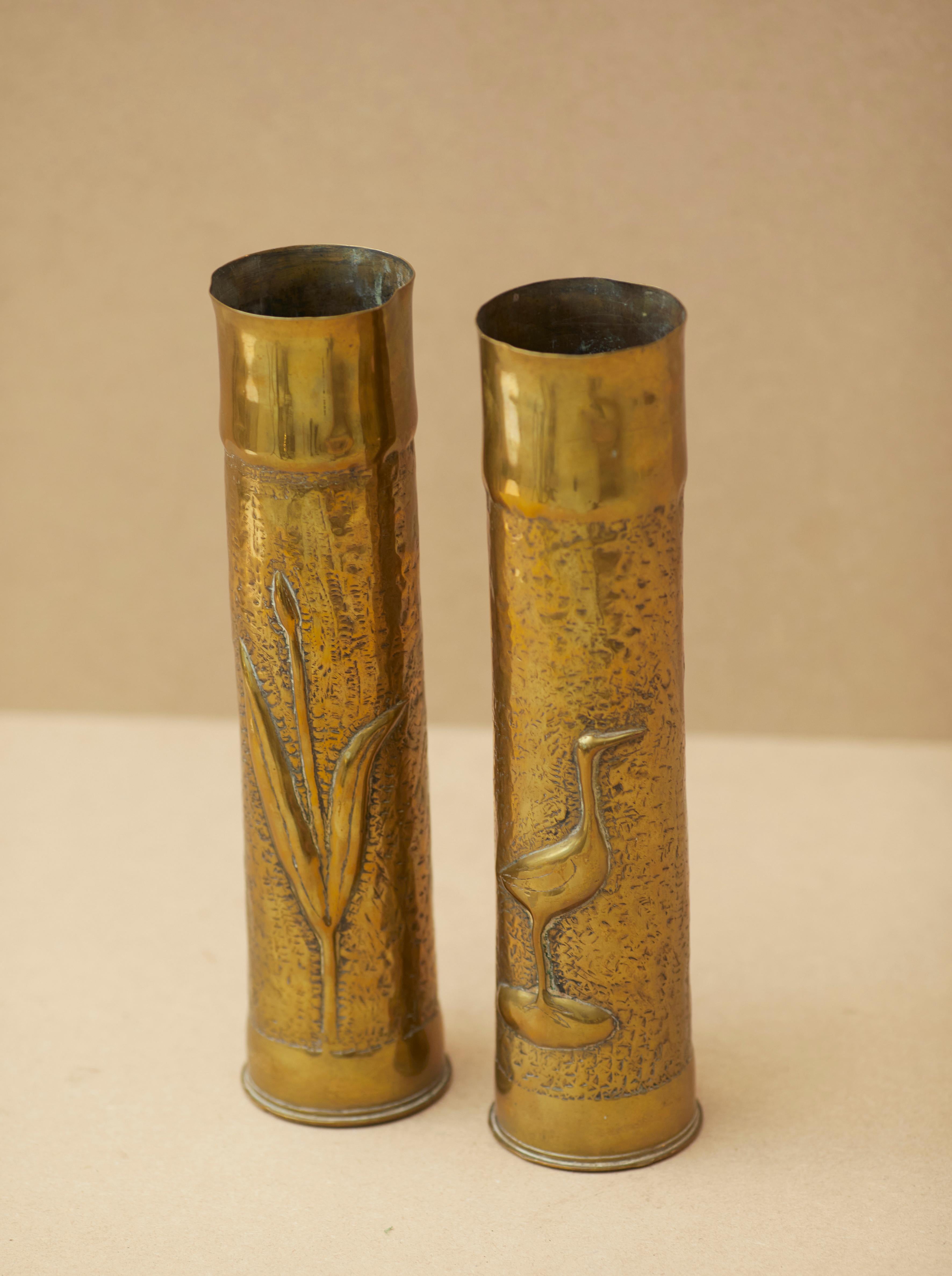 A pair of unique, heavily patinated, hand-crafted historical memorabilia from World War 1, France, between 1914 and 1918.

Trench art (