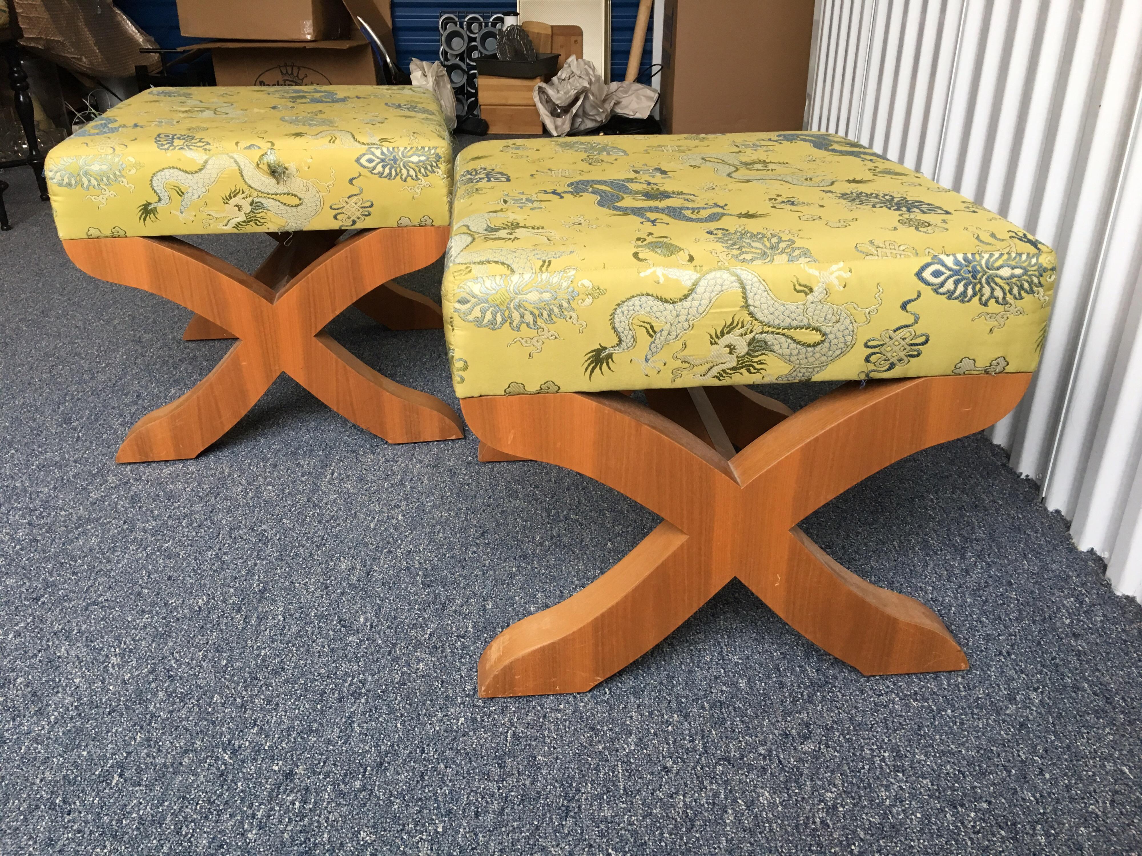 Pair of X-base stools in silk embroidered fabric, custom made X-base stools in lime green and blue embroidered fabric. Some scratches to bases, fabric has thread pulls in some areas. Frame in good stable condition.