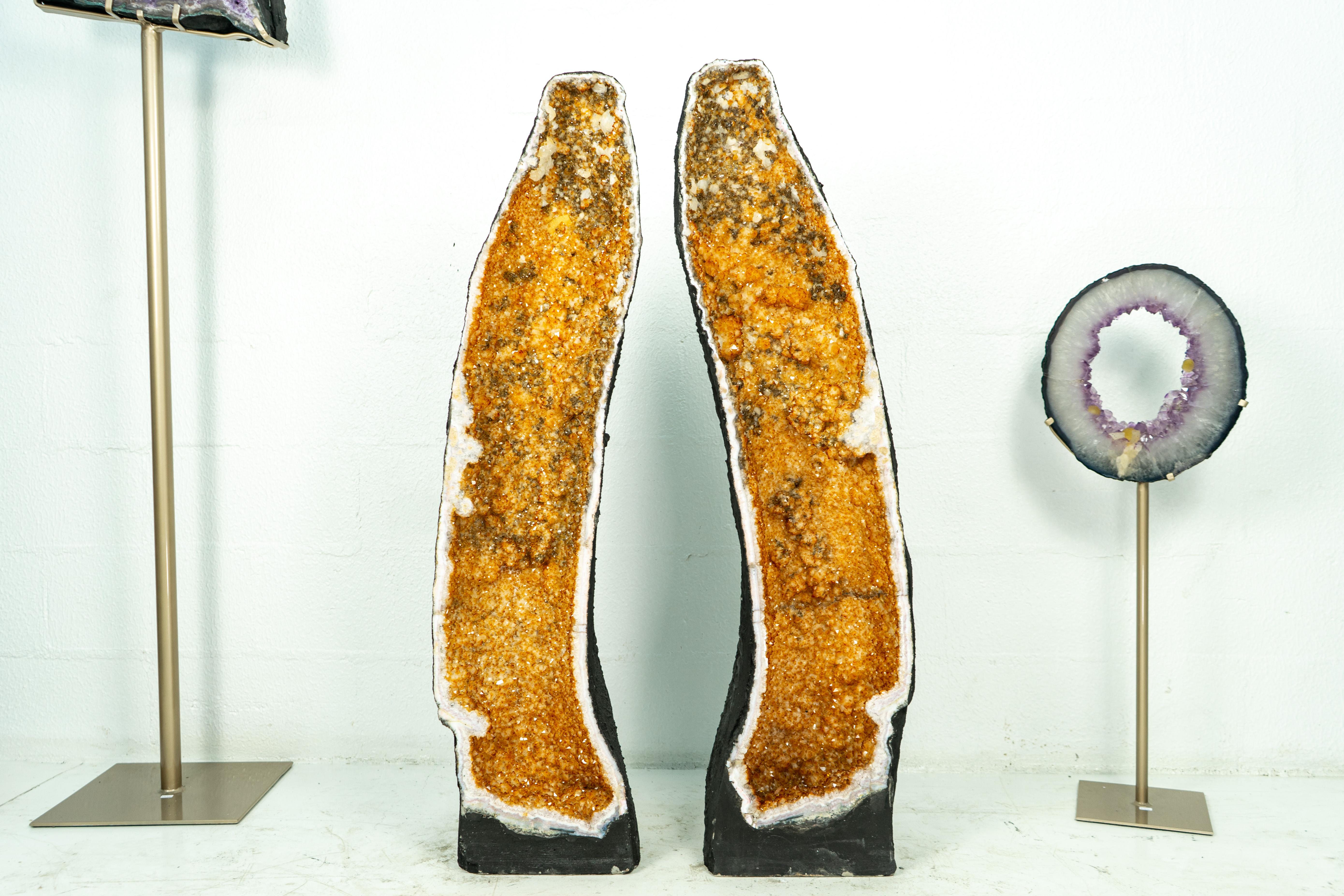 Standing at more than 45 Inches and bringing rare color, formation, and inclusions, this pair of X-Tall and Large Citrine Cathedrals is a once-in-a-lifetime find and will be an amazing addition to your Crystal Collection or the main attraction to