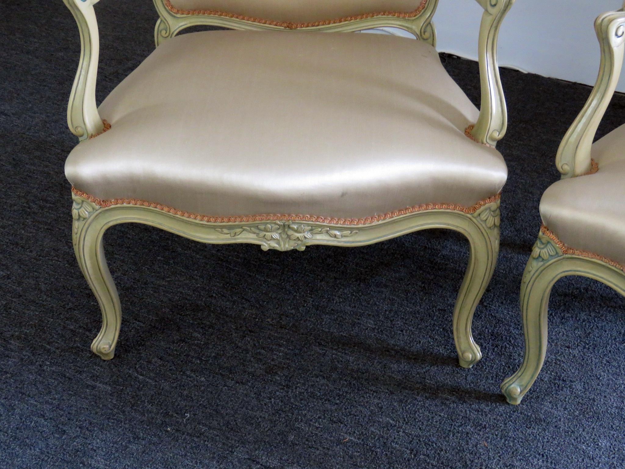 Pair of Yale R Burge Louis XVI style distressed painted fauteuils.