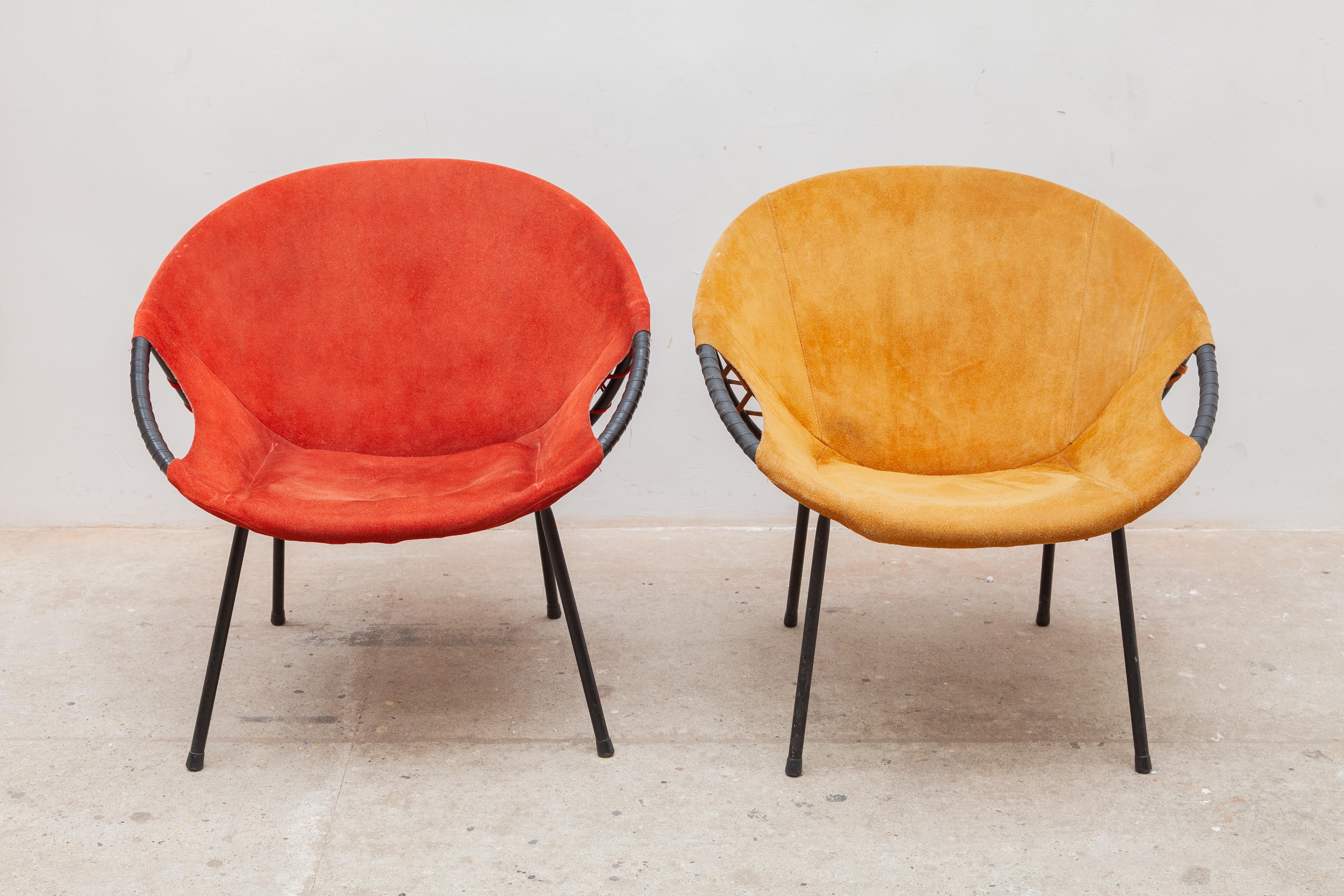 Set of two leather balloon chairs designed by Hans Olsen in the 1950s, is very comfortable and has a very characteristic and identifiable shape. The piece comprises a black metal frame with yellow and red colored orange suede leather covering