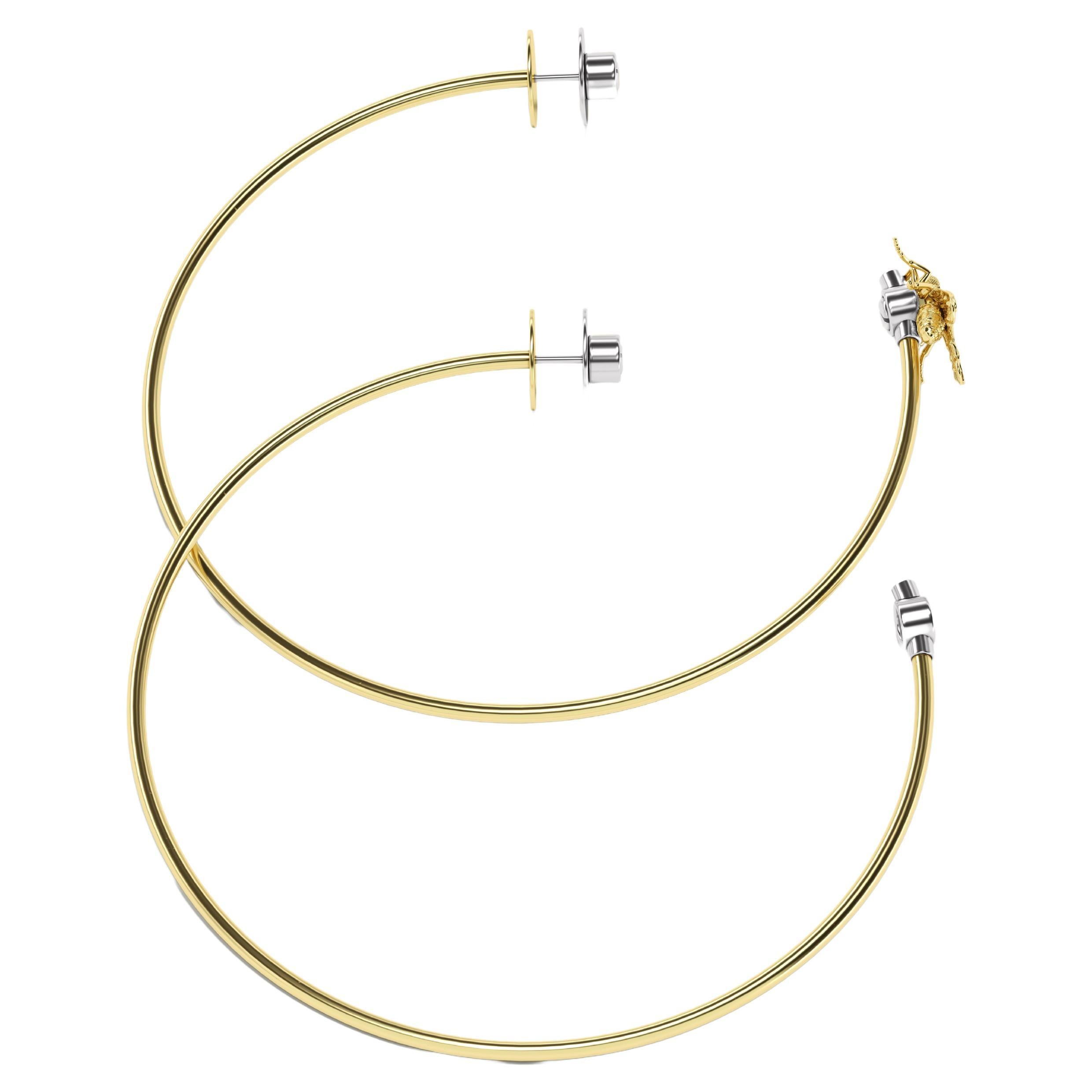 Pair of hoop earrings (⌀ 90 mm) with removable Fly, 18K yellow gold.
The post and bracket are made of steel, which provides a secure closure of the earring and prevents allergic reactions.
For everyday wear, the owner can easily remove the Fly using