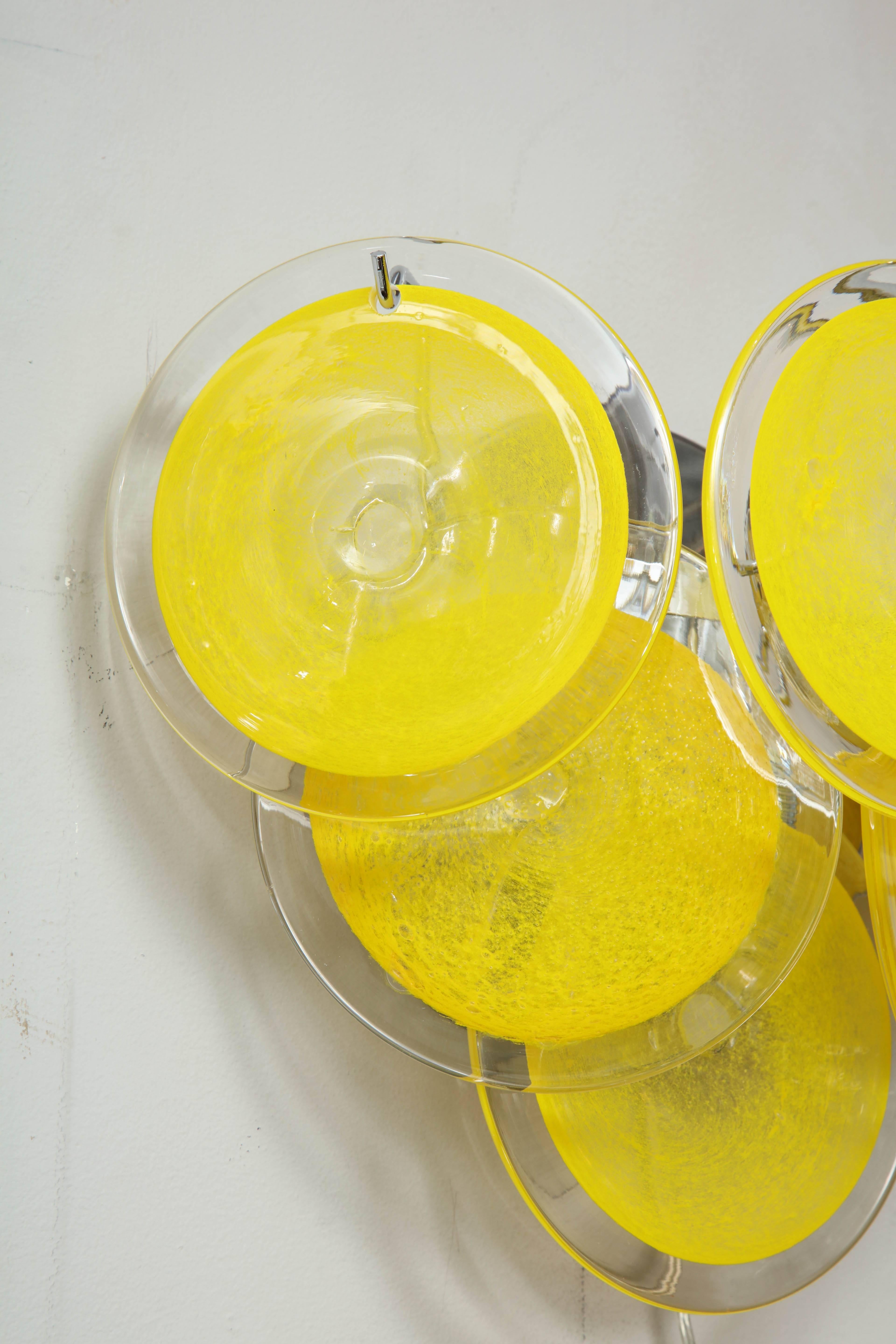 Late 20th Century Pair of Yellow Murano Glass Disc Sconces