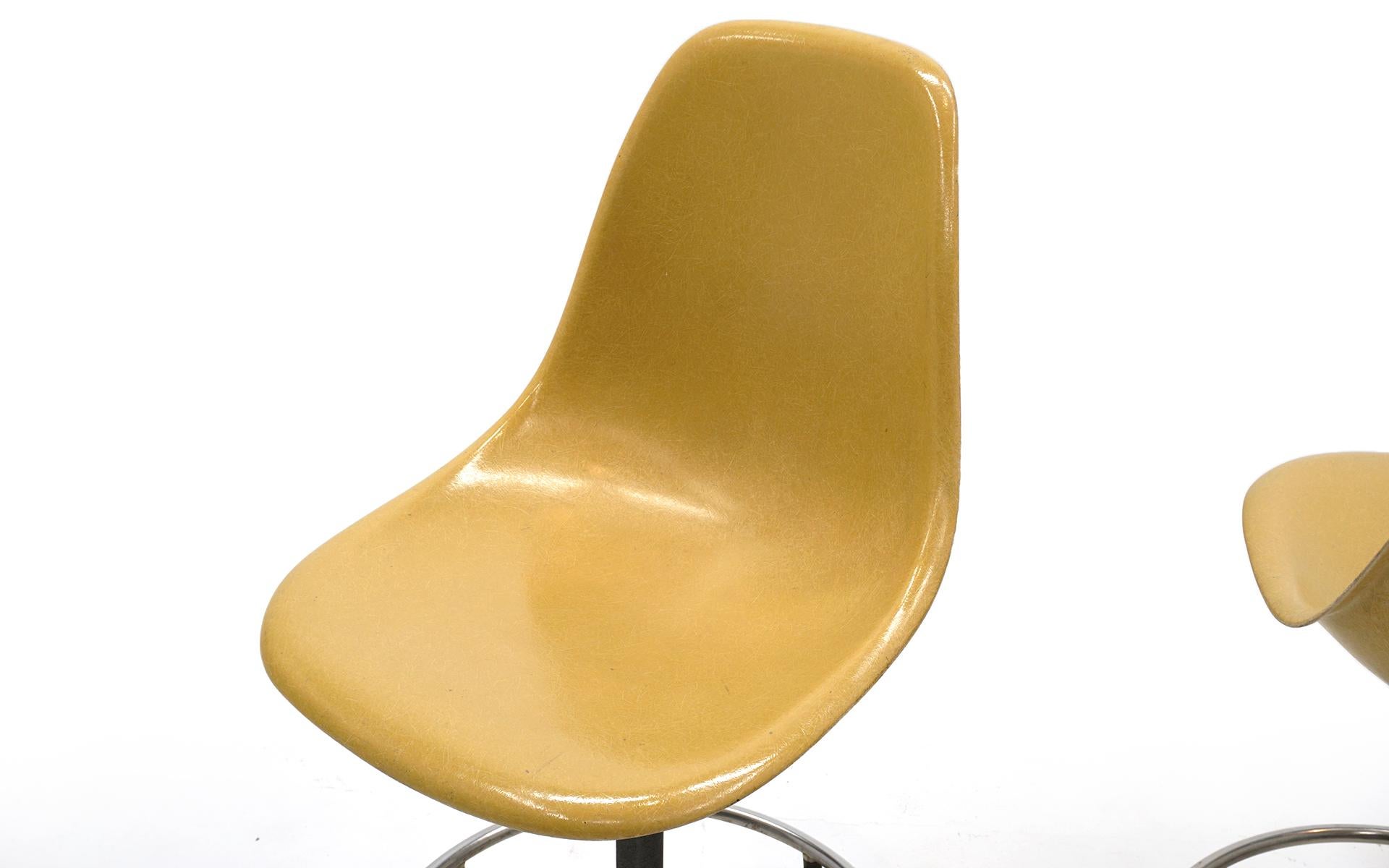 Mid-20th Century Pair of Yellow, Swivel Barstools / Drafting Stools by Charles and Ray Eames For Sale