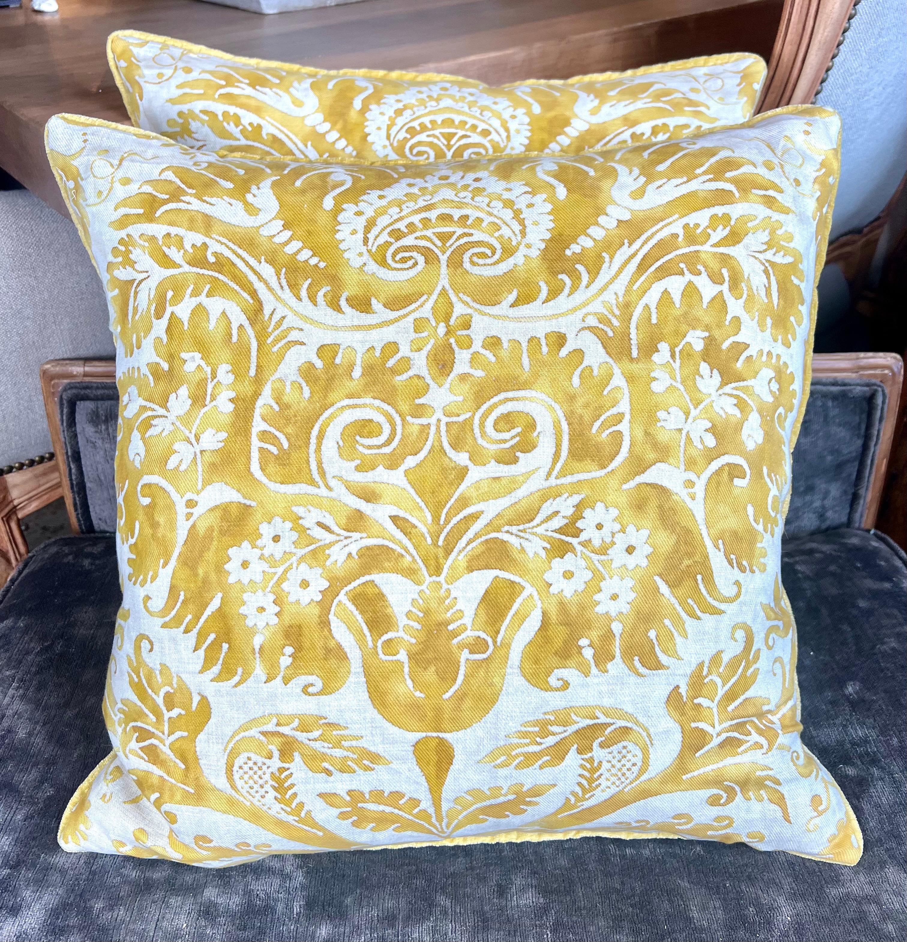 Stunning pair of Fortuny textile pillows adorned with the illustrious De Medici pattern, a design that pays homage to the legacy of the Medici family.  This pattern is not merely decorative; it encapsulates a narrative of wealth, influence, and a