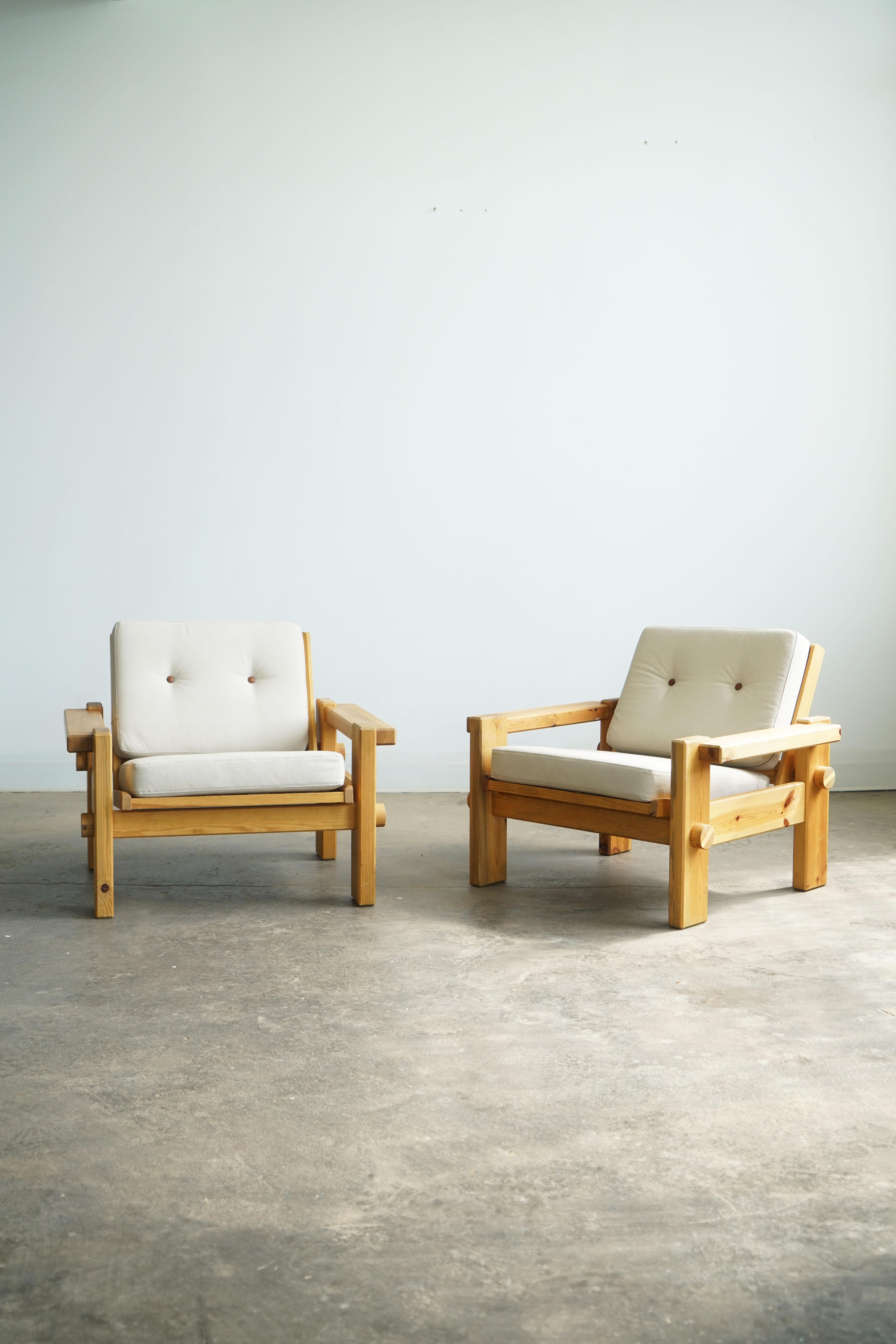 Pair of Yngve Ekström Dymling lounge chairs
Swedese Möbler AB
Sweden, circa 1970

These uncommon lounge chairs are made from solid pine and have beautiful wood detailing and construction. Both chairs are marked with Swedese manufacturers marks.  