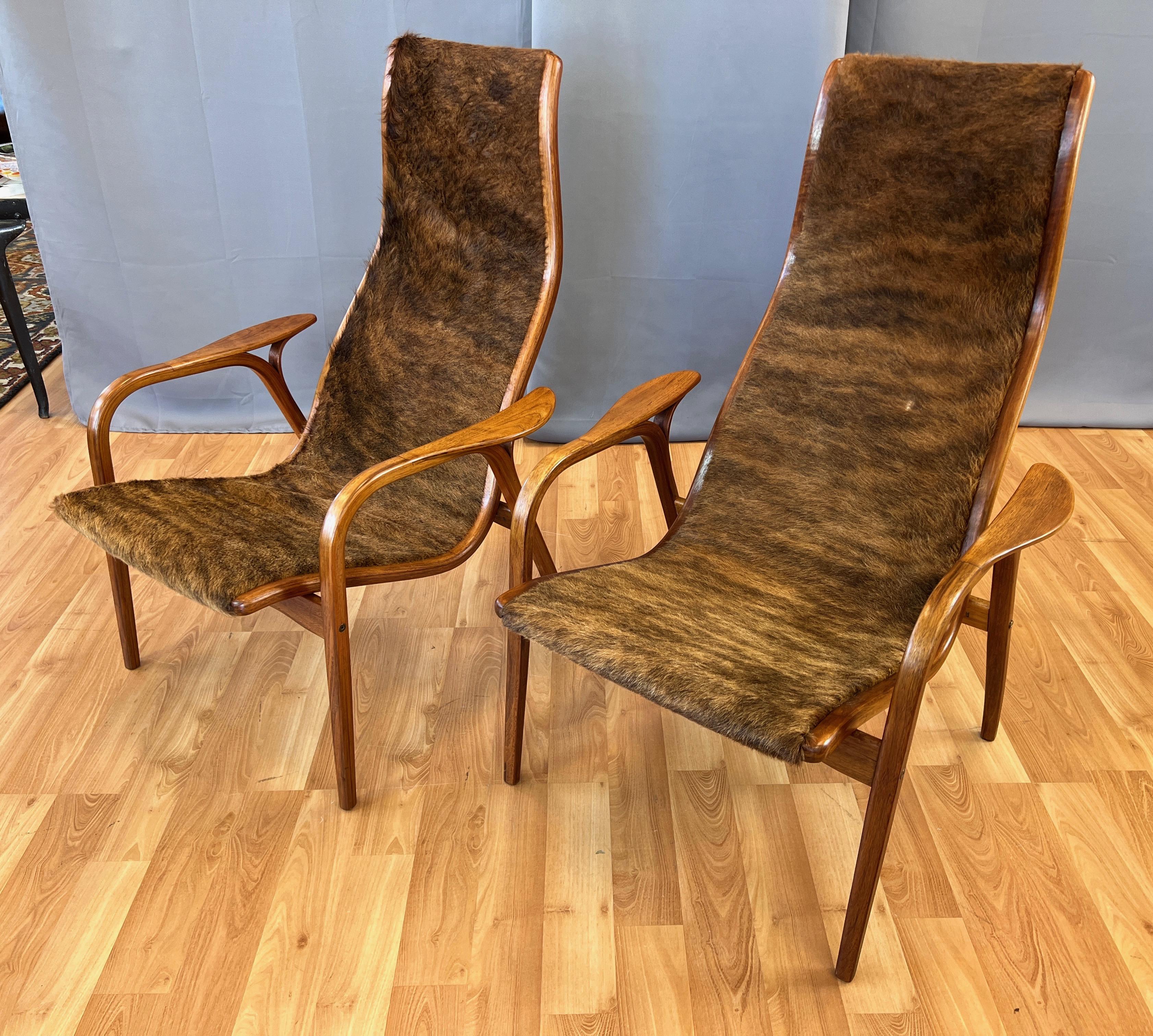 Scandinavian Modern Pair of Yngve Ekström Lamino Teak with Cowhide Lounge Chairs for Swedese, 1950s