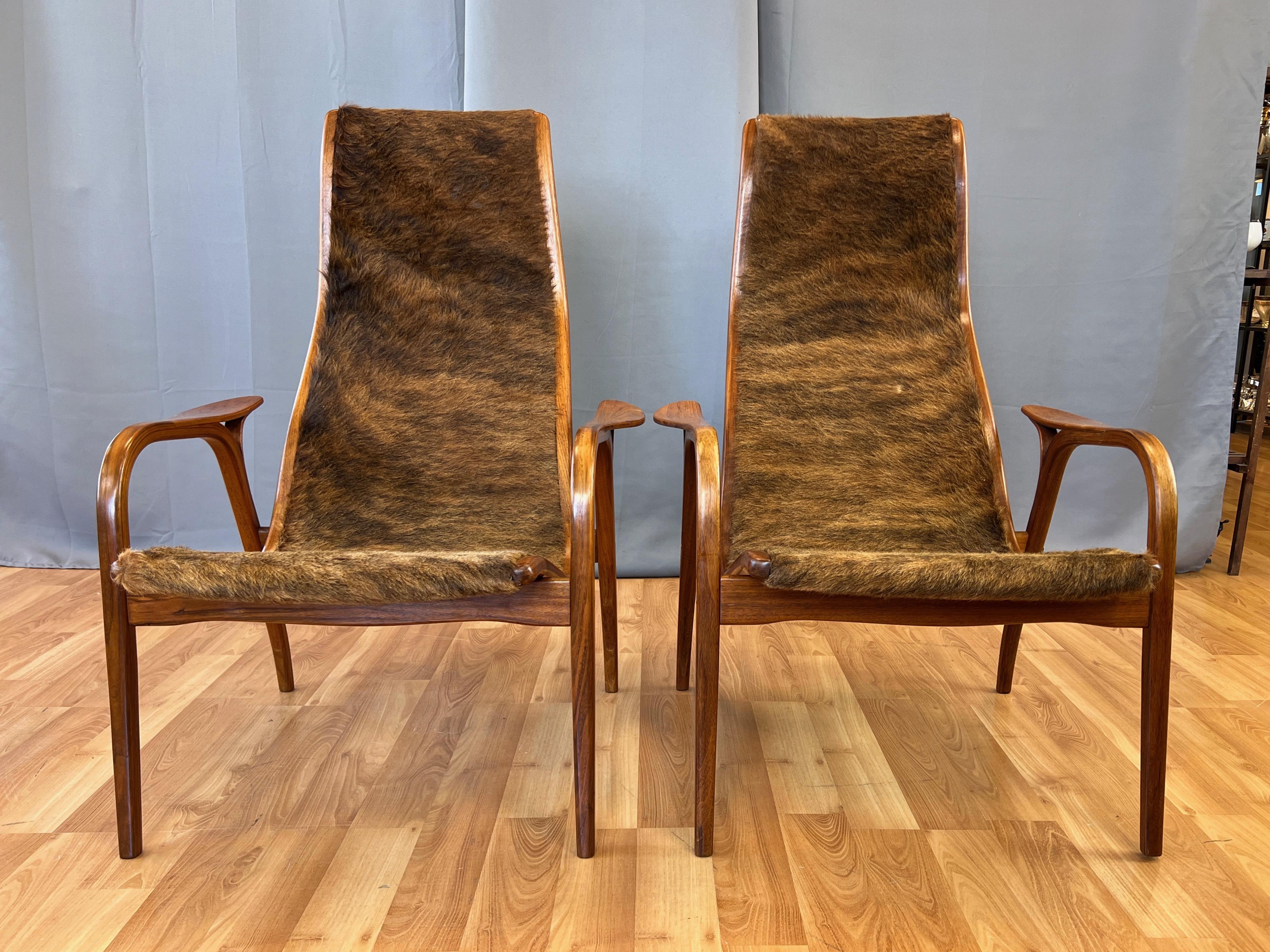 Pair of Yngve Ekström Lamino Teak with Cowhide Lounge Chairs for Swedese, 1950s In Good Condition In San Francisco, CA