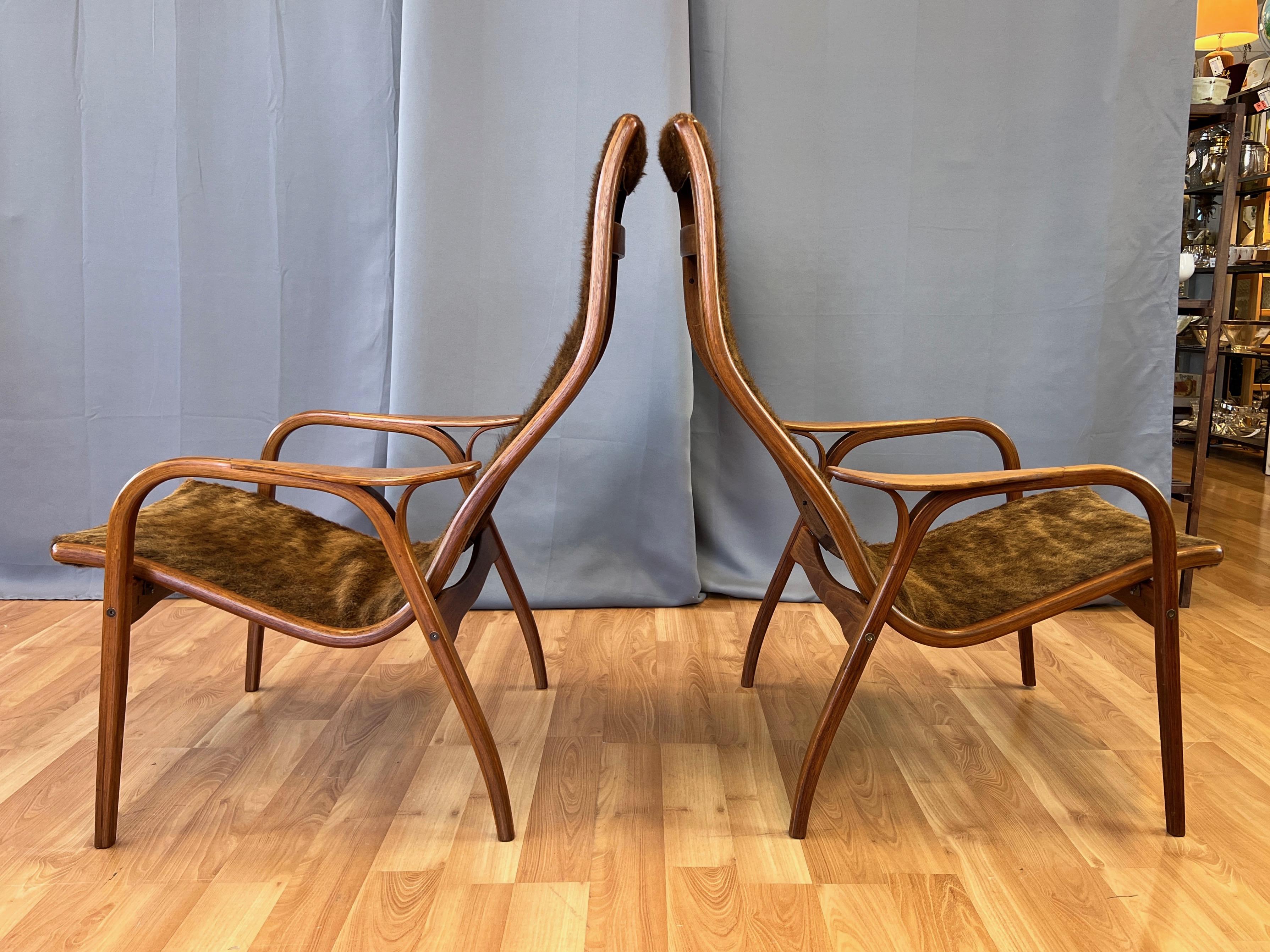 Mid-20th Century Pair of Yngve Ekström Lamino Teak with Cowhide Lounge Chairs for Swedese, 1950s