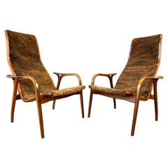 Pair of Yngve Ekström Lamino Teak with Cowhide Lounge Chairs for Swedese, 1950s