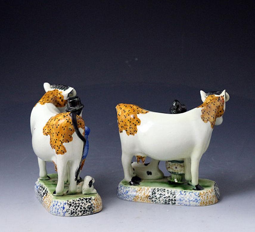 English Pair of Yorkshire Pottery Figures of Cows Prattware, Early 19th Century For Sale