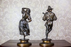 Paire de figurines anciennes en zamak, musicien et danseuse, Europe, années 1930