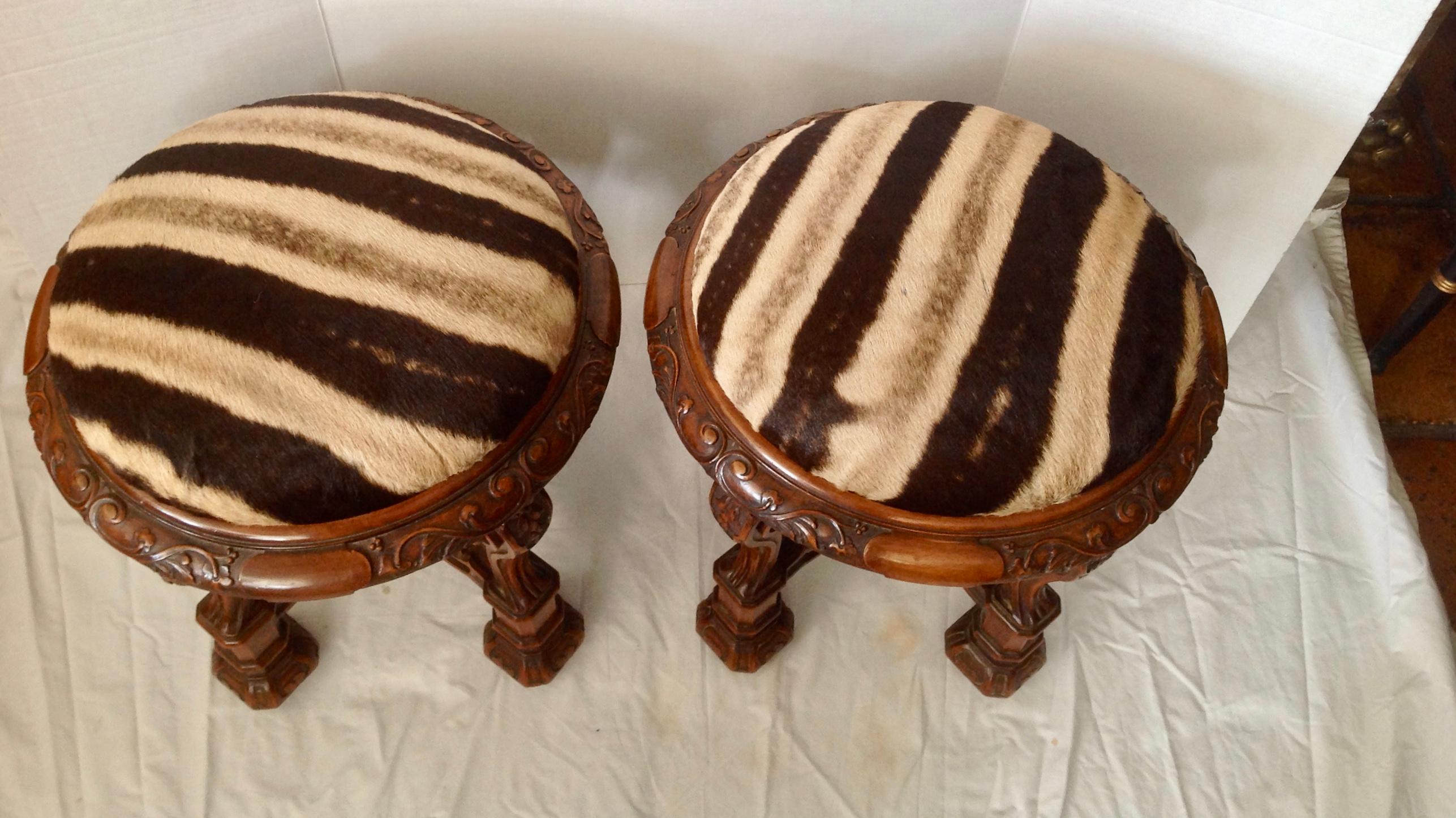 Carved Pair of Zebra Hide Covered Stools