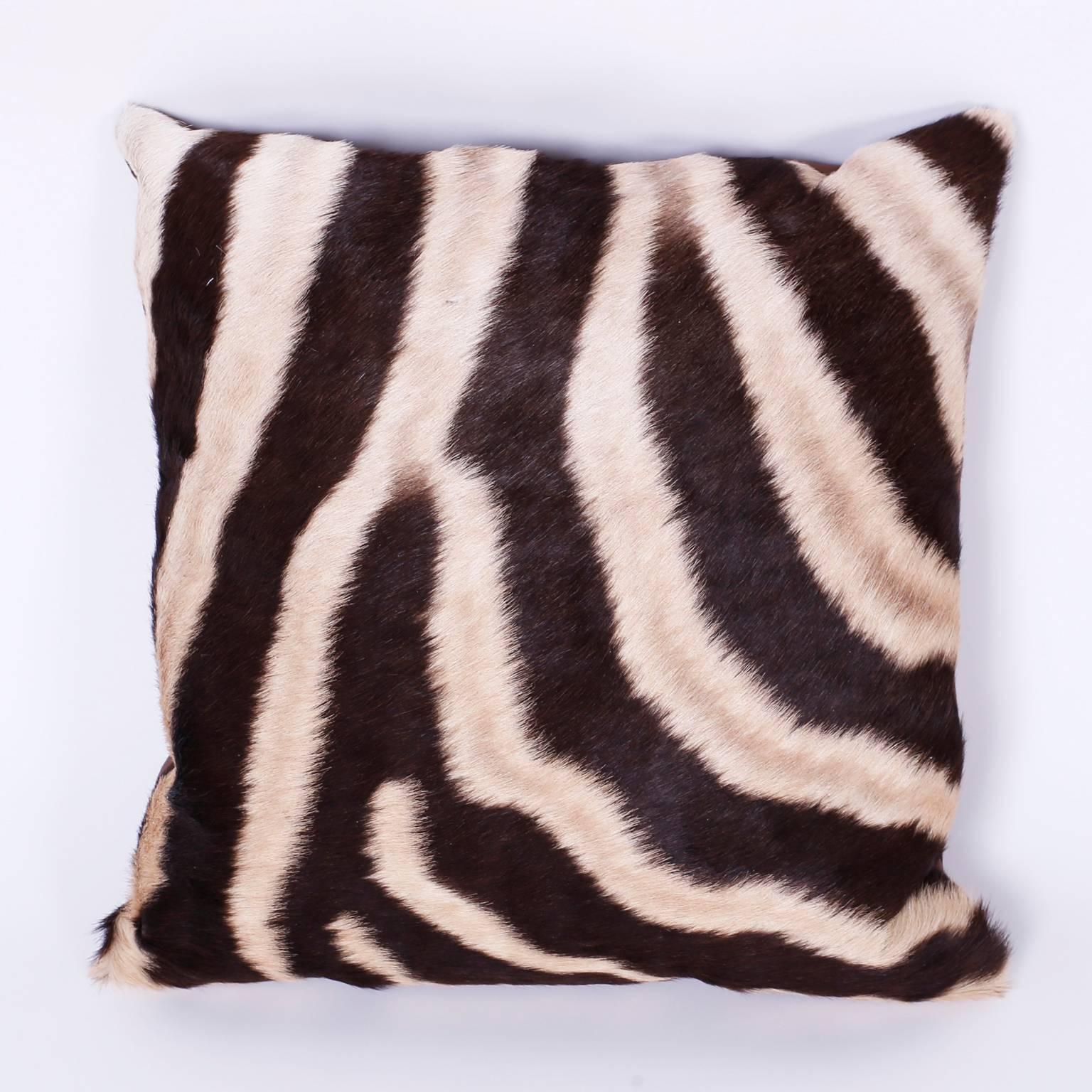 Chic pair of organic zebra hide pillows displaying nature's iconic camouflage. The backs are cotton with zippers for easy care.
  