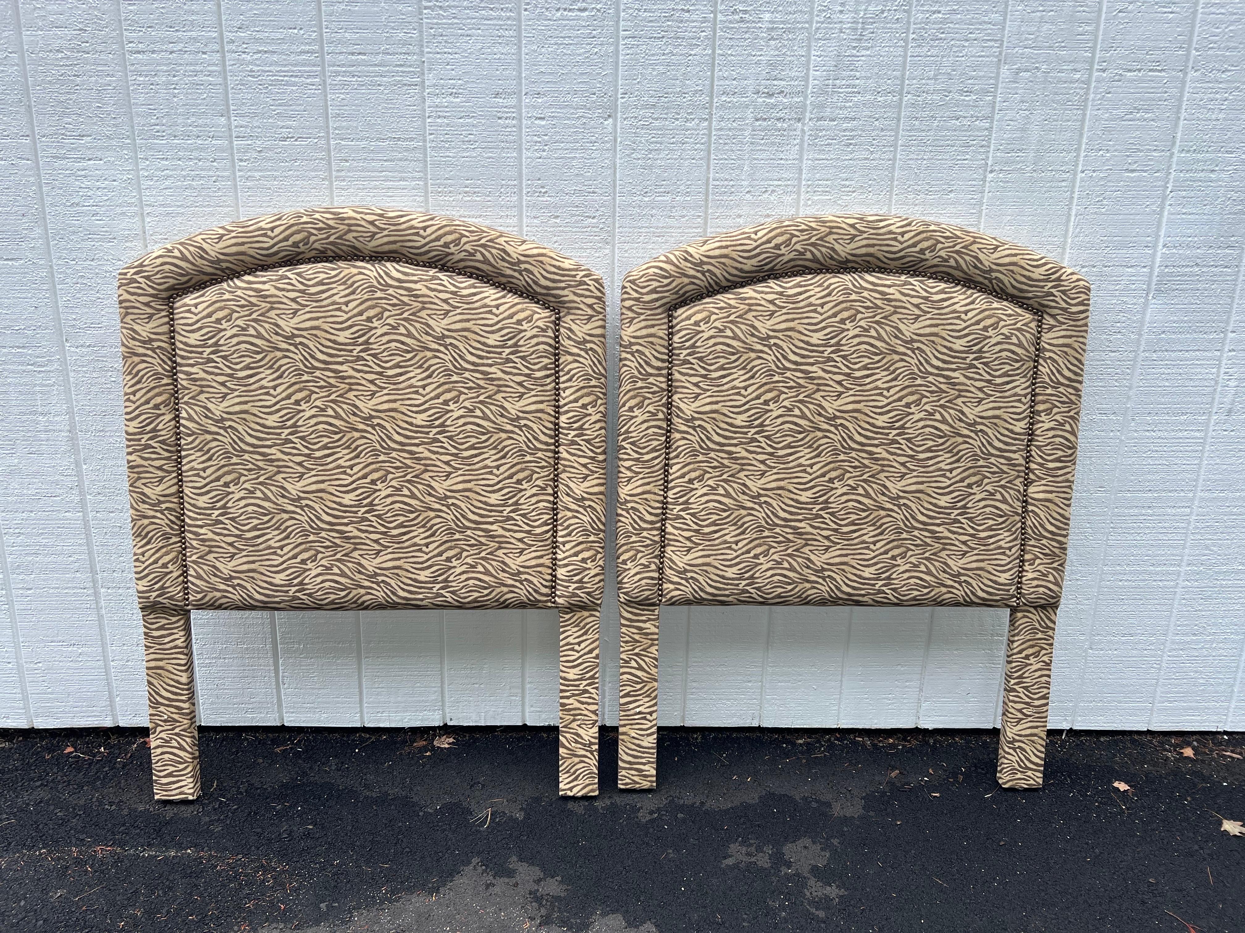 Pair of Zebra Print Twin Headboards. Classic design with gunmetal beads. 
In excellent condition. Use as is or recover but they don't need to be recovered.