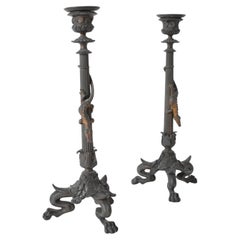 Pair of zoomorphic bronze candle holders, XIXth c.