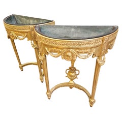 Coppia di giardiniere in legno dorato del 19° secolo