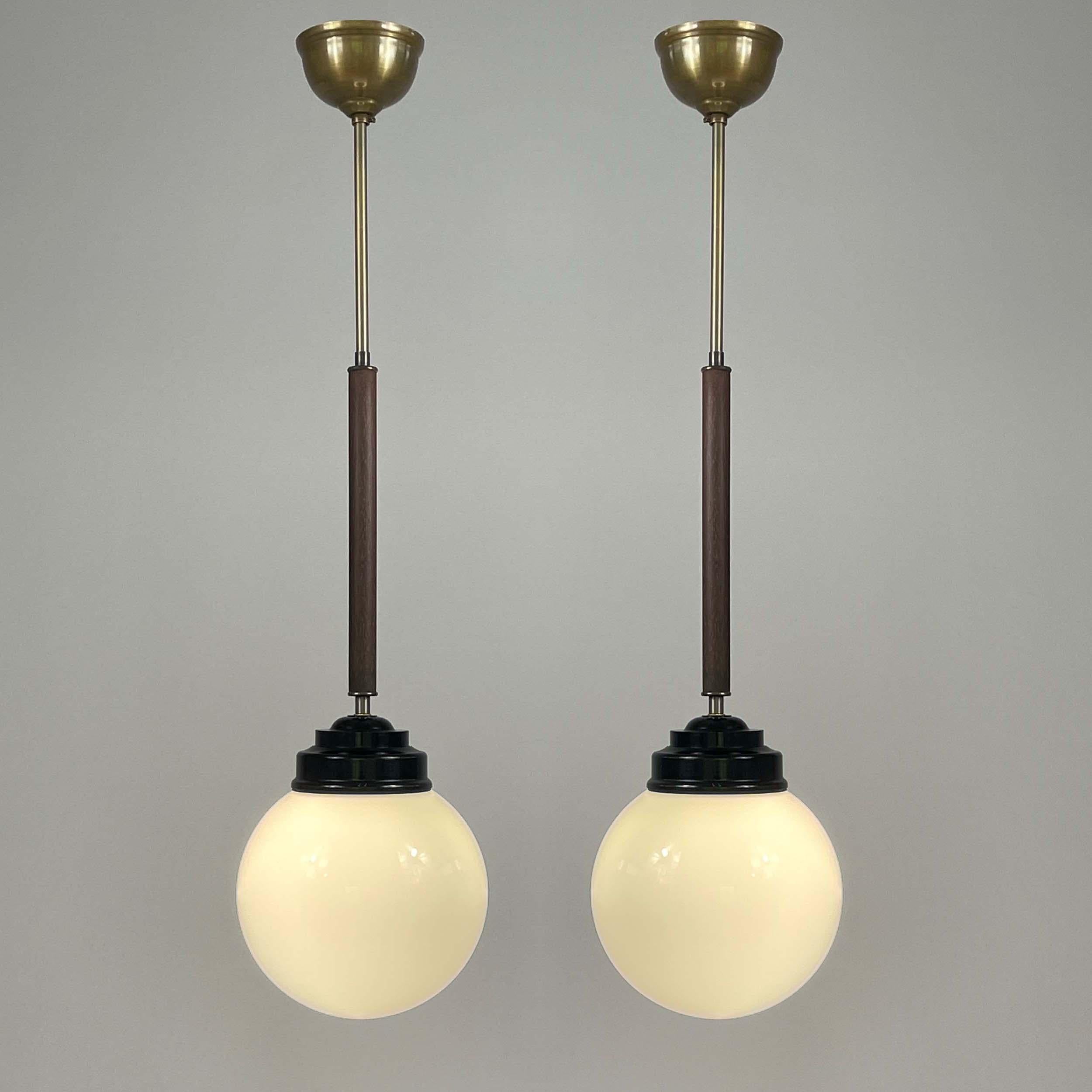 Art Deco Pair Opaline Glass, Bakelite & Wood Pendants by SIEVERTS KABELVERK, Sweden 1940s For Sale