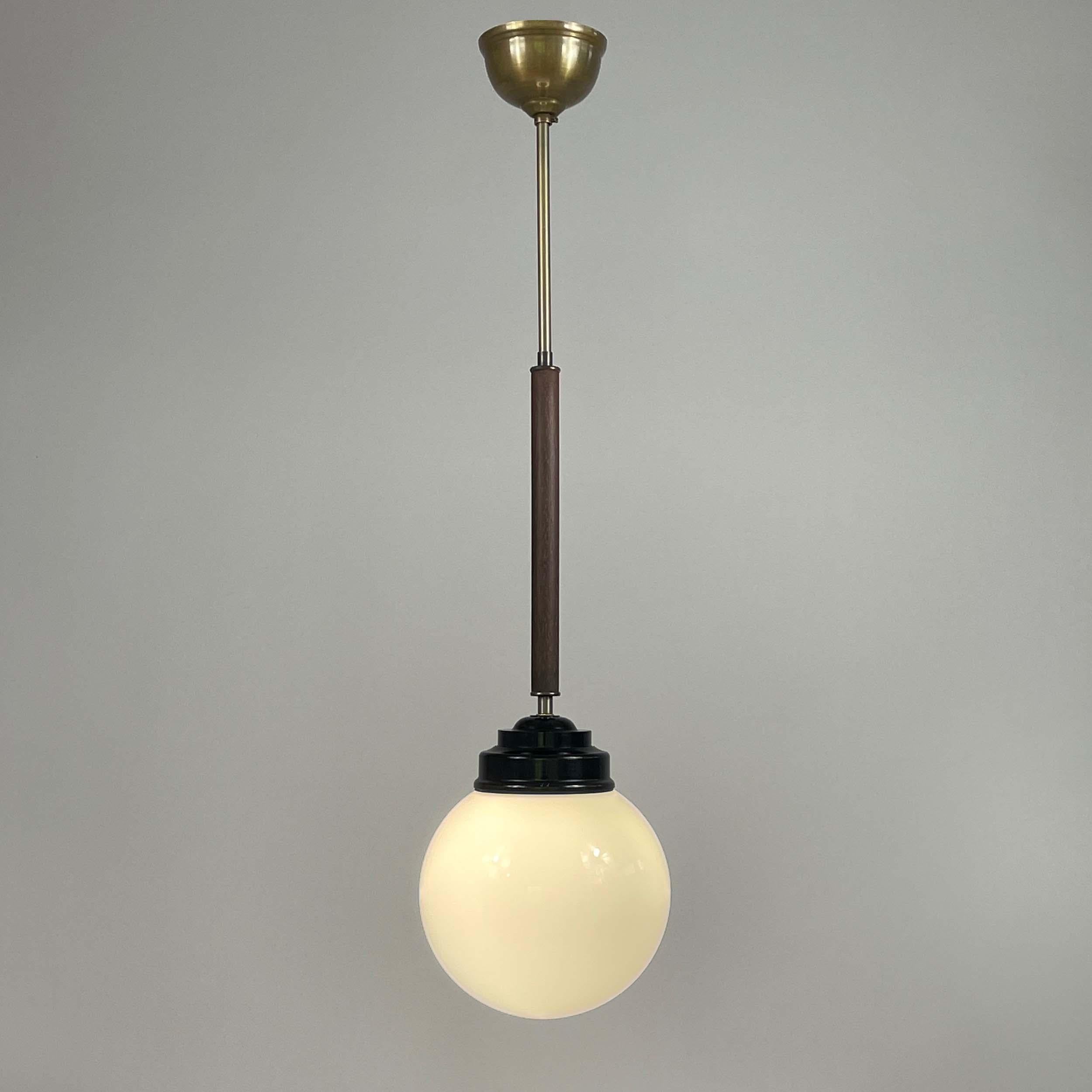 Pair Opaline Glass, Bakelite & Wood Pendants by SIEVERTS KABELVERK, Sweden 1940s In Good Condition For Sale In NUEMBRECHT, NRW